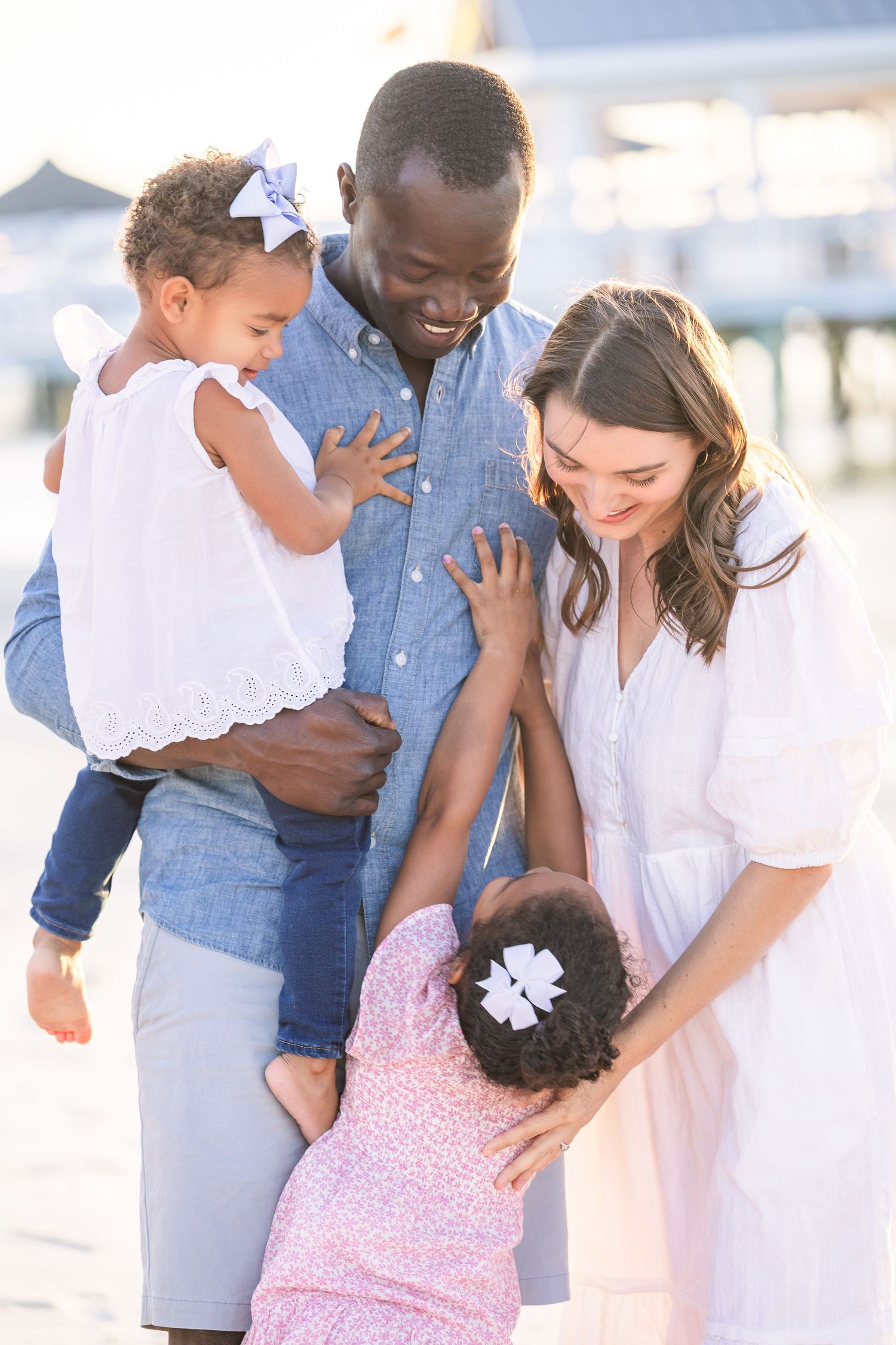 Intimate family portraits showing natural interactions and joy.