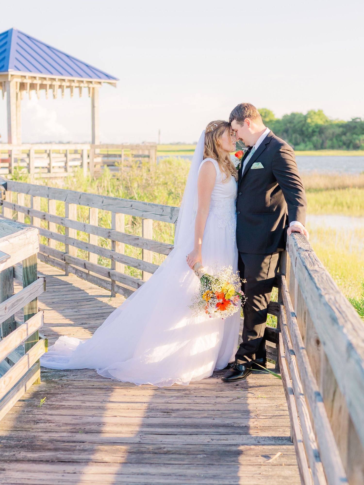 Romantic wedding photo sequence of couple dancing southport elopement wedding bride groom light and airy classic