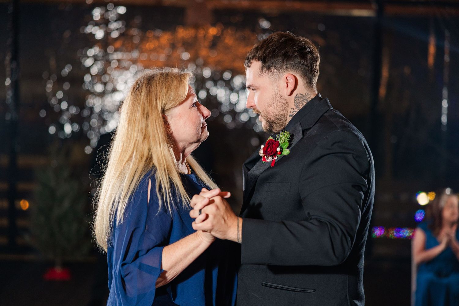 A couple shares an intimate dance moment during their wedding celebration wedding groom bride wilmington North Carolina photographer light