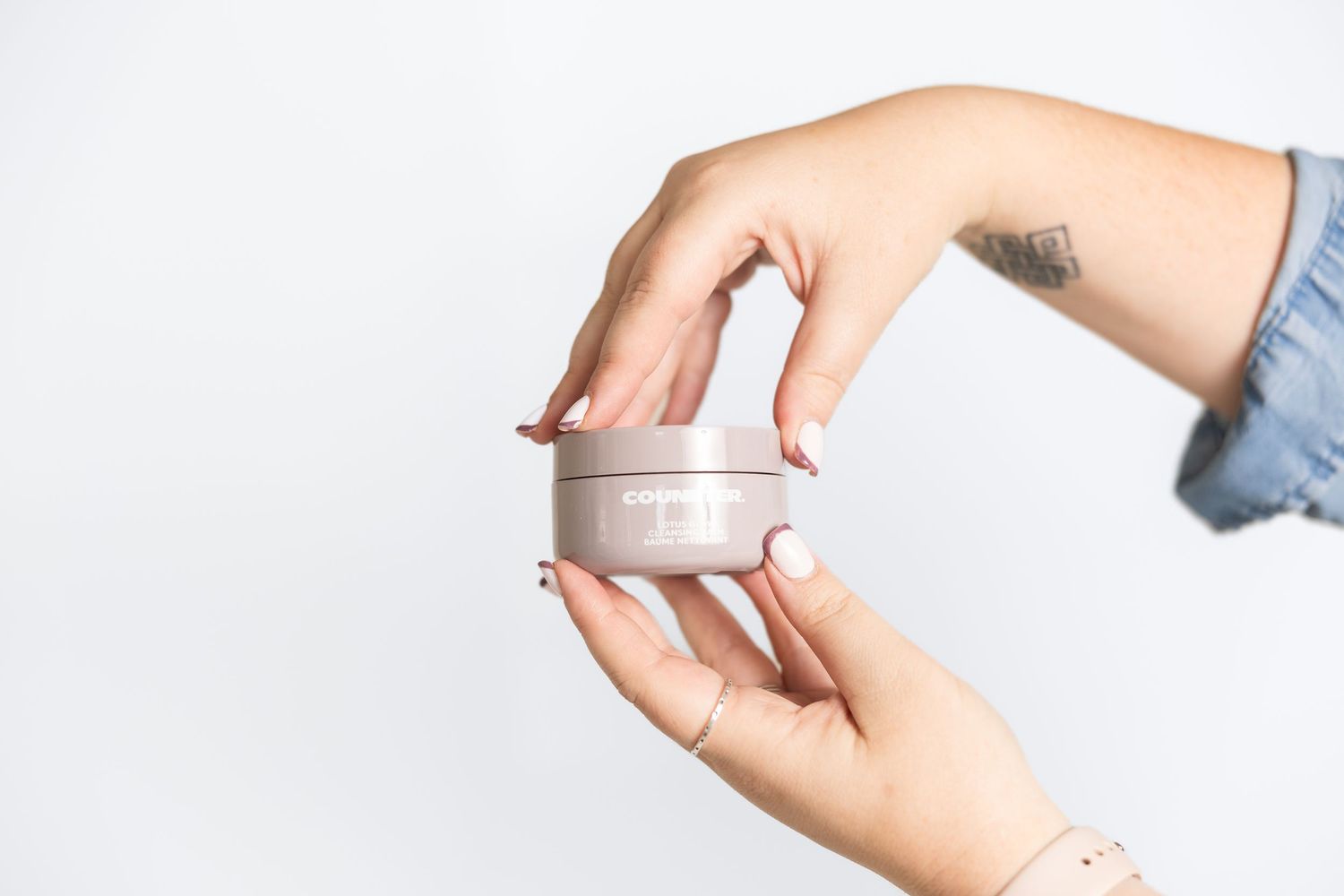 Series of hands demonstrating product application gestures against white background.