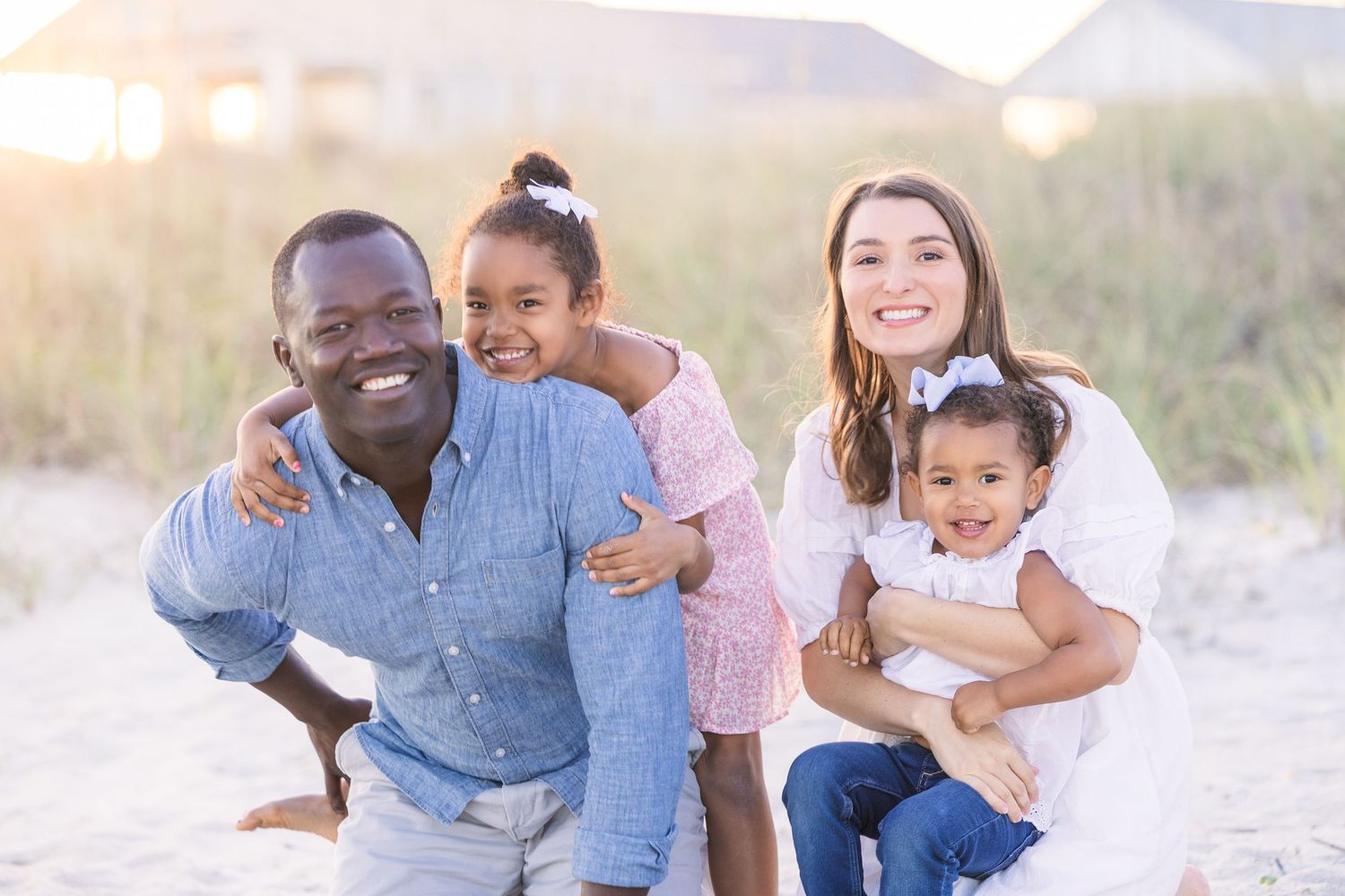 Heartwarming family beach session showing authentic connections and laughter.