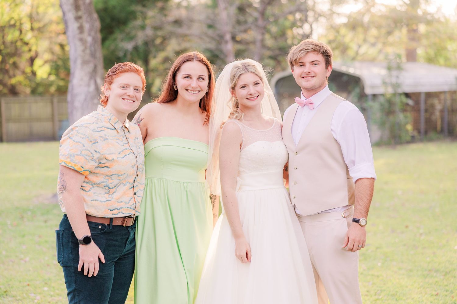 Wedding party poses together outdoors wedding groom bride wilmington photographer light and airy classic Wrightsville Beach
