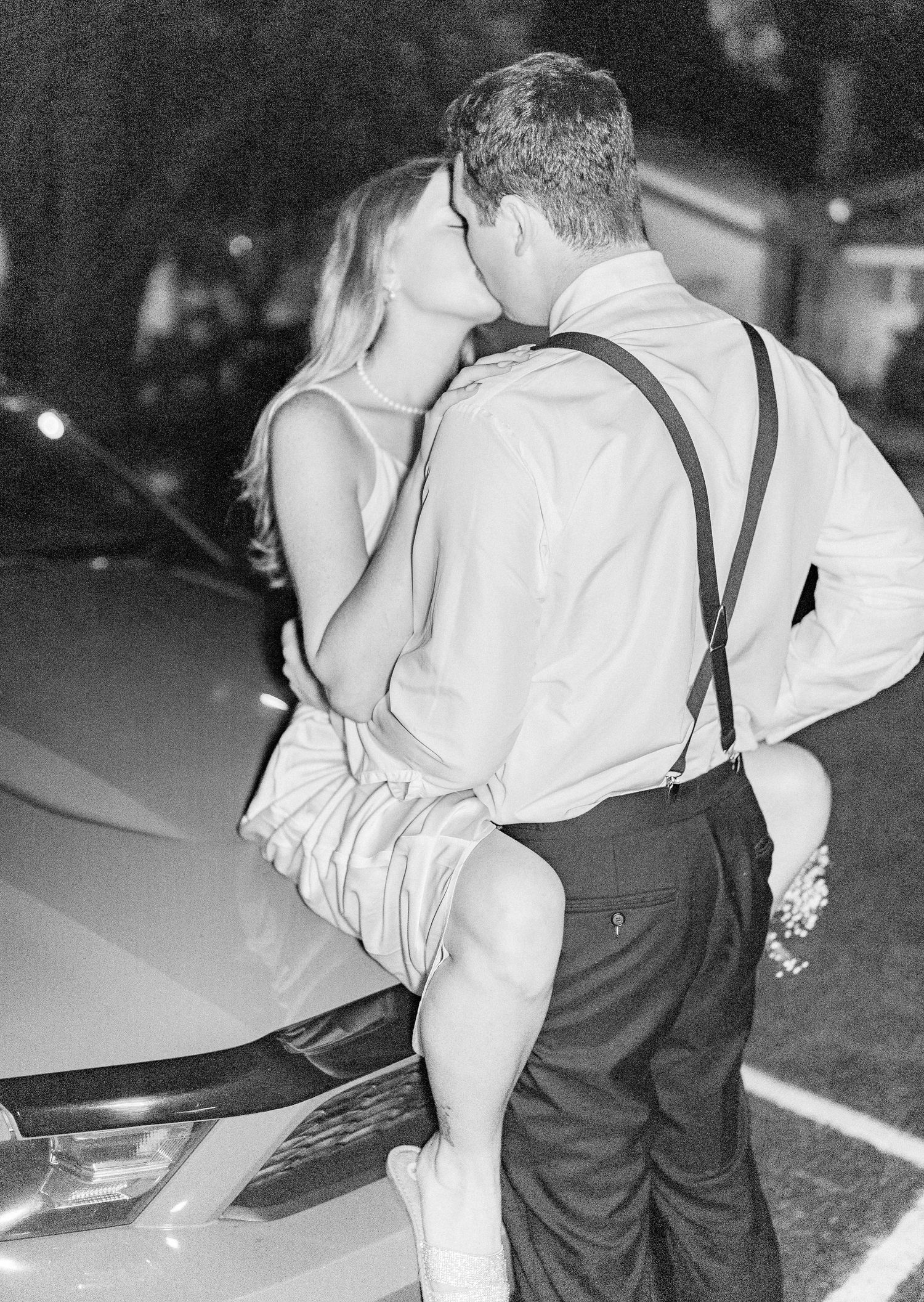 Black and white photo series of romantic embraces between newlyweds southport elopement wedding bride groom light and airy classic