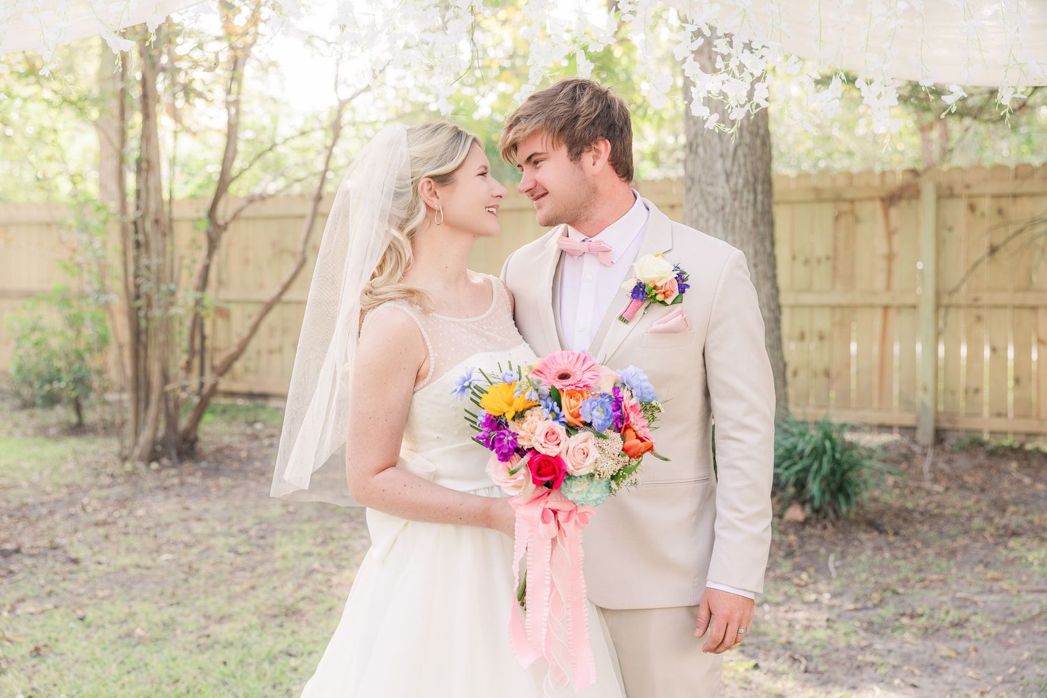 Romantic wedding portraits in a garden wedding groom bride wilmington photographer light and airy classic Wrightsville Beach