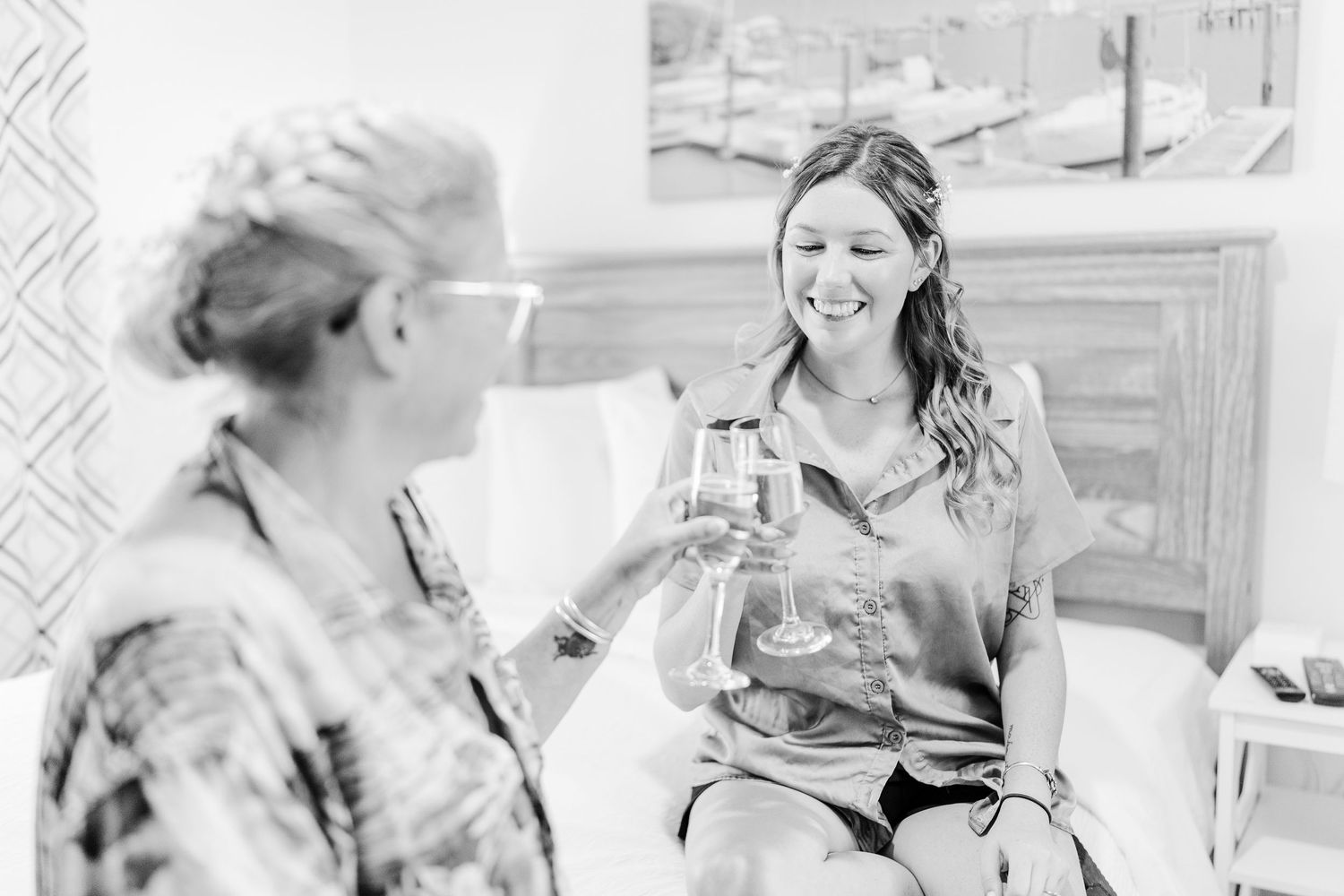 Black and white candid photos capture joyful wedding day preparation moments southport elopement wedding bride groom light and airy classic