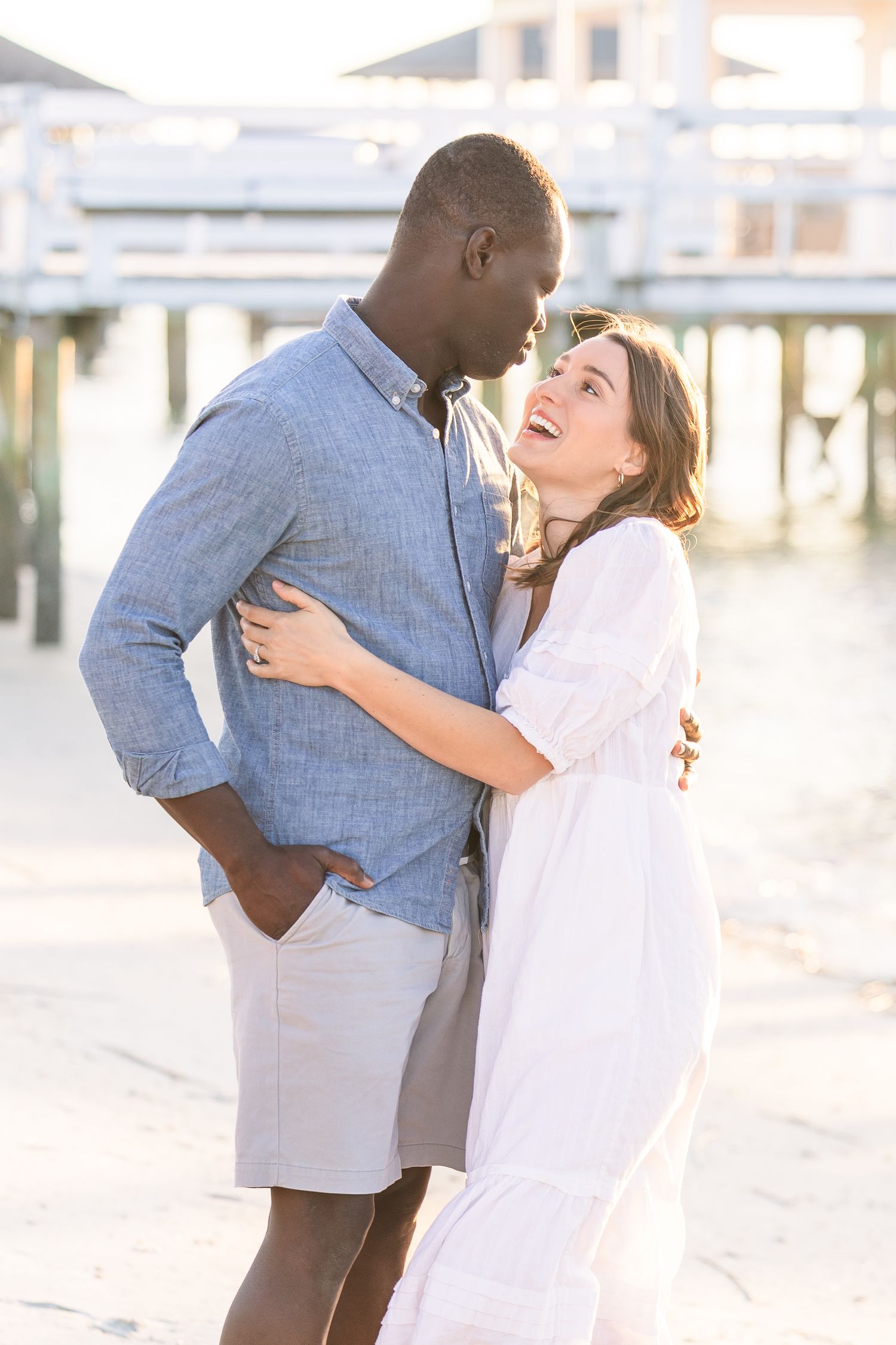 Romantic couple portraits with coastal scenery in the background.
