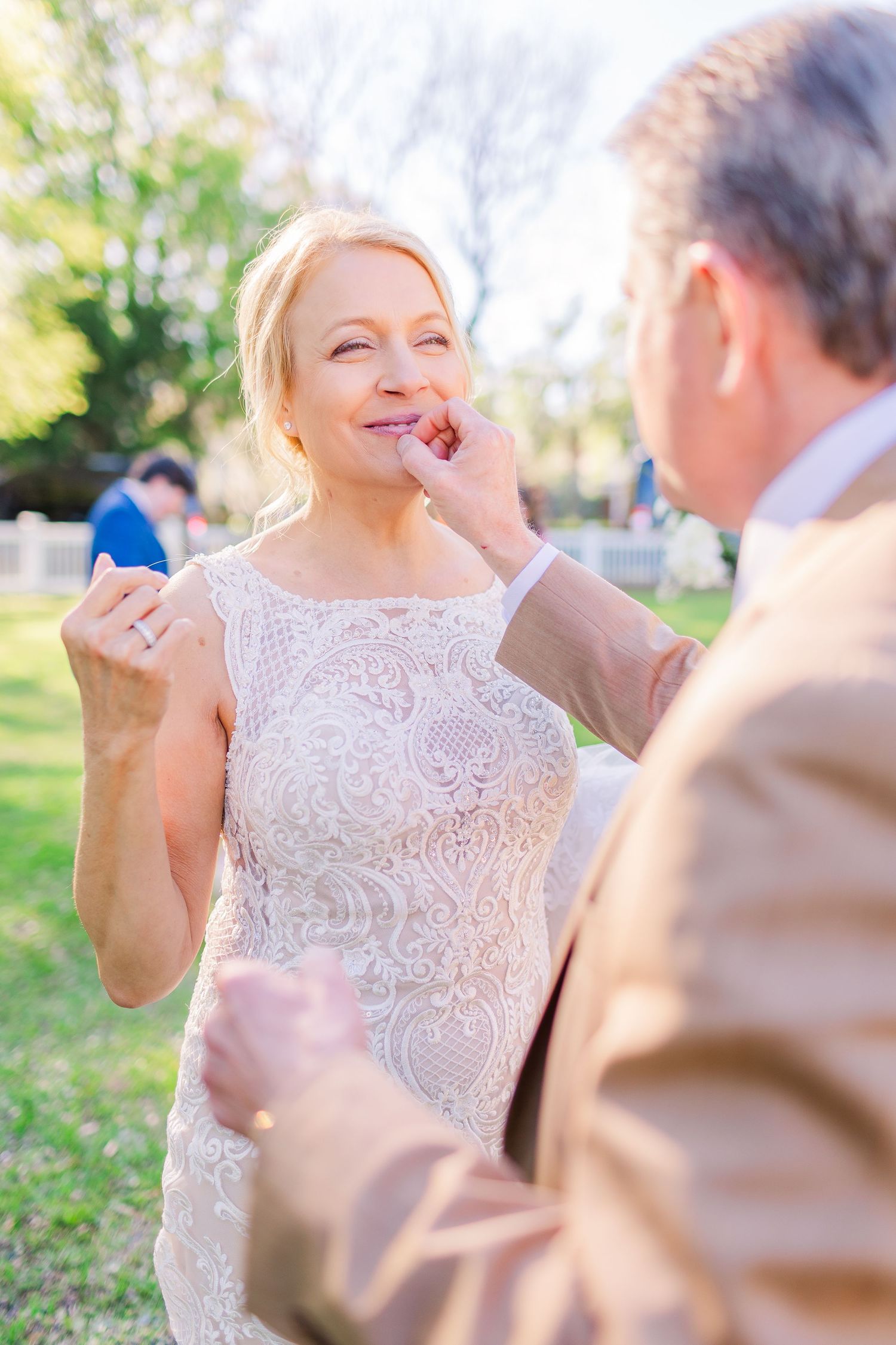 Joyful wedding moments captured in a series of candid outdoor photos with natural lighting.