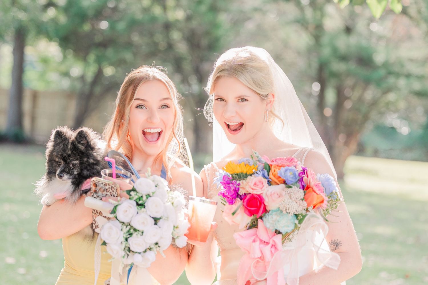 Bridal party celebrates with colorful bouquets wedding groom bride wilmington photographer light and airy classic Wrightsville Beach