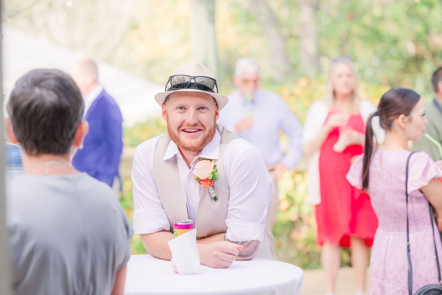 Outdoor wedding reception with guests wedding groom bride wilmington photographer light and airy classic Wrightsville Beach
