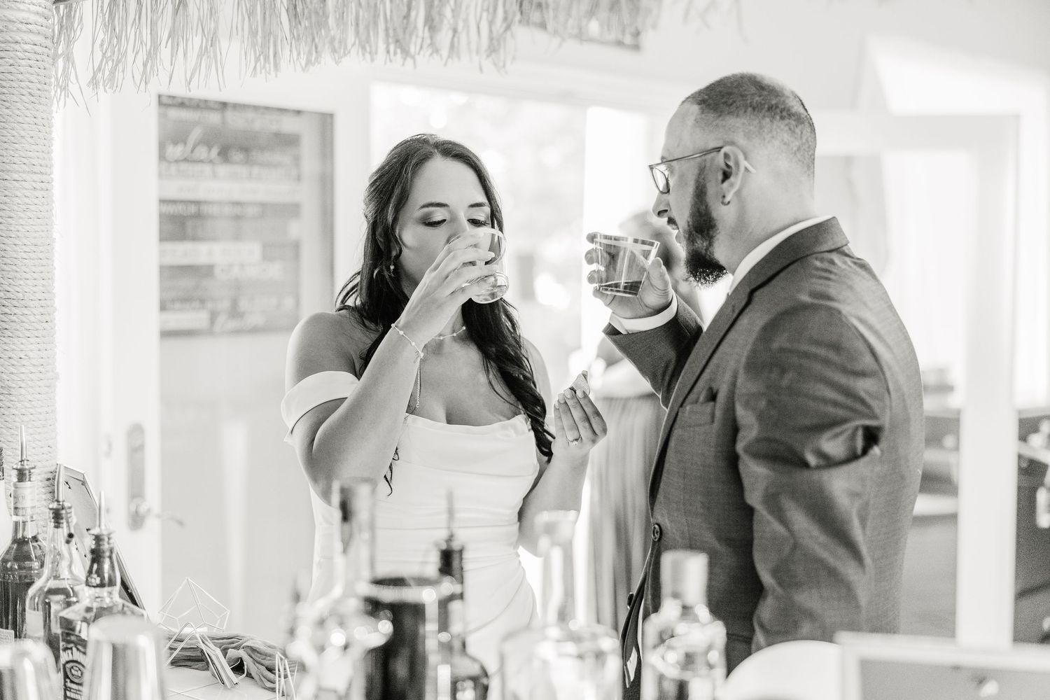 Black and white wedding reception scene with dancing and celebration wedding groom bride lake Gaston photographer light airy