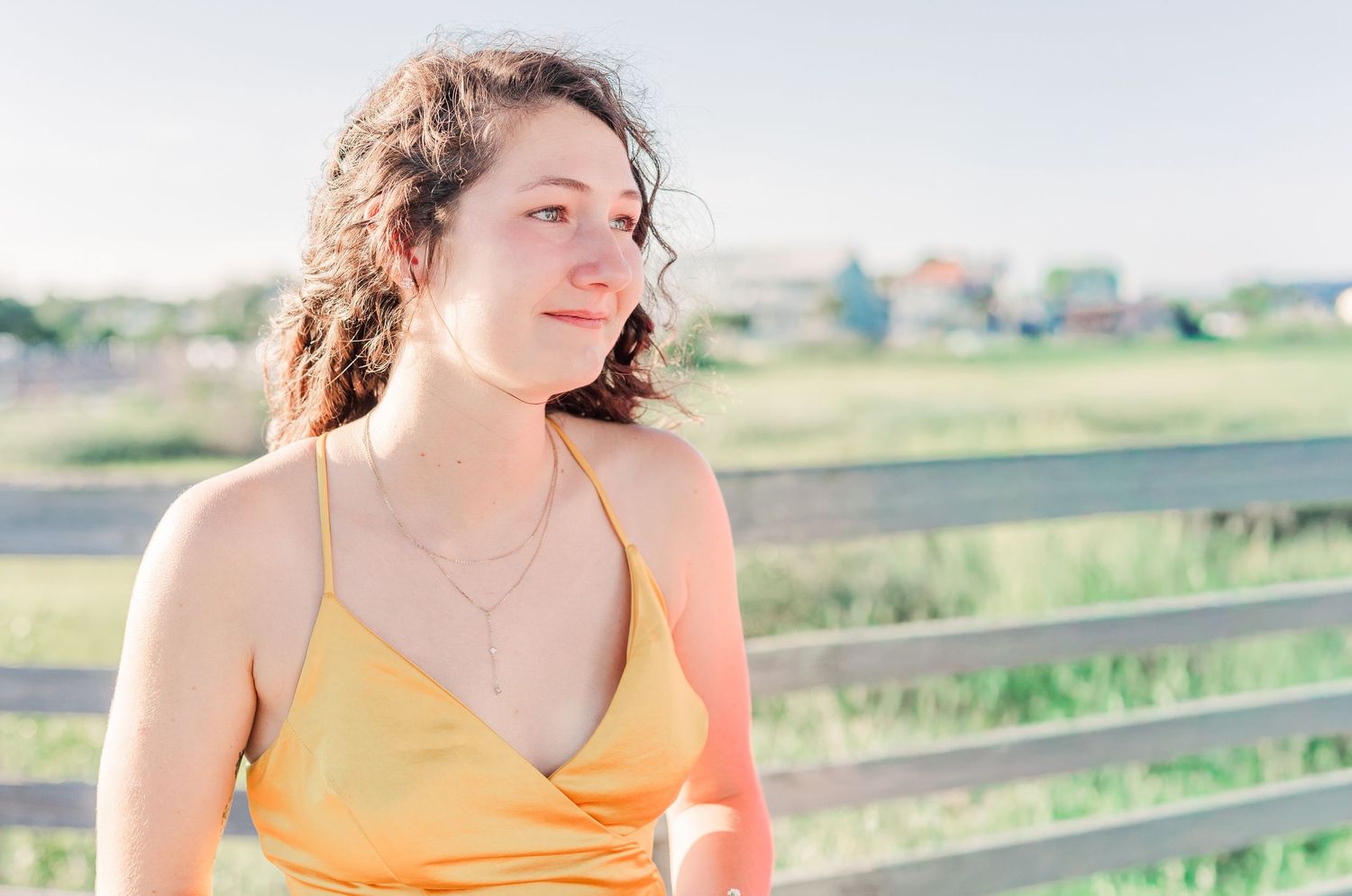 Sunlit portrait of person in yellow dress southport elopement wedding bride groom light and airy classic