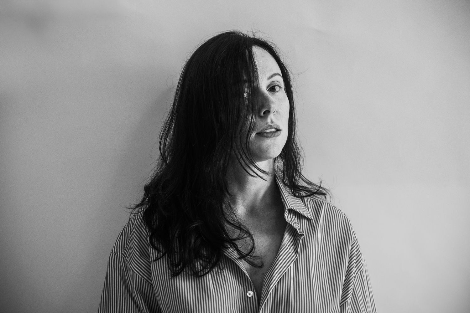 Black and white portrait series showing emotional expressions and movement.