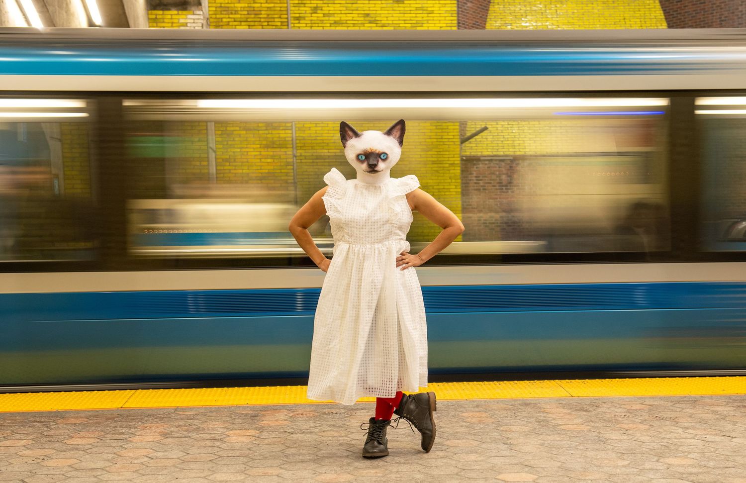Subway platform sequence showing movement and white-dressed figures.