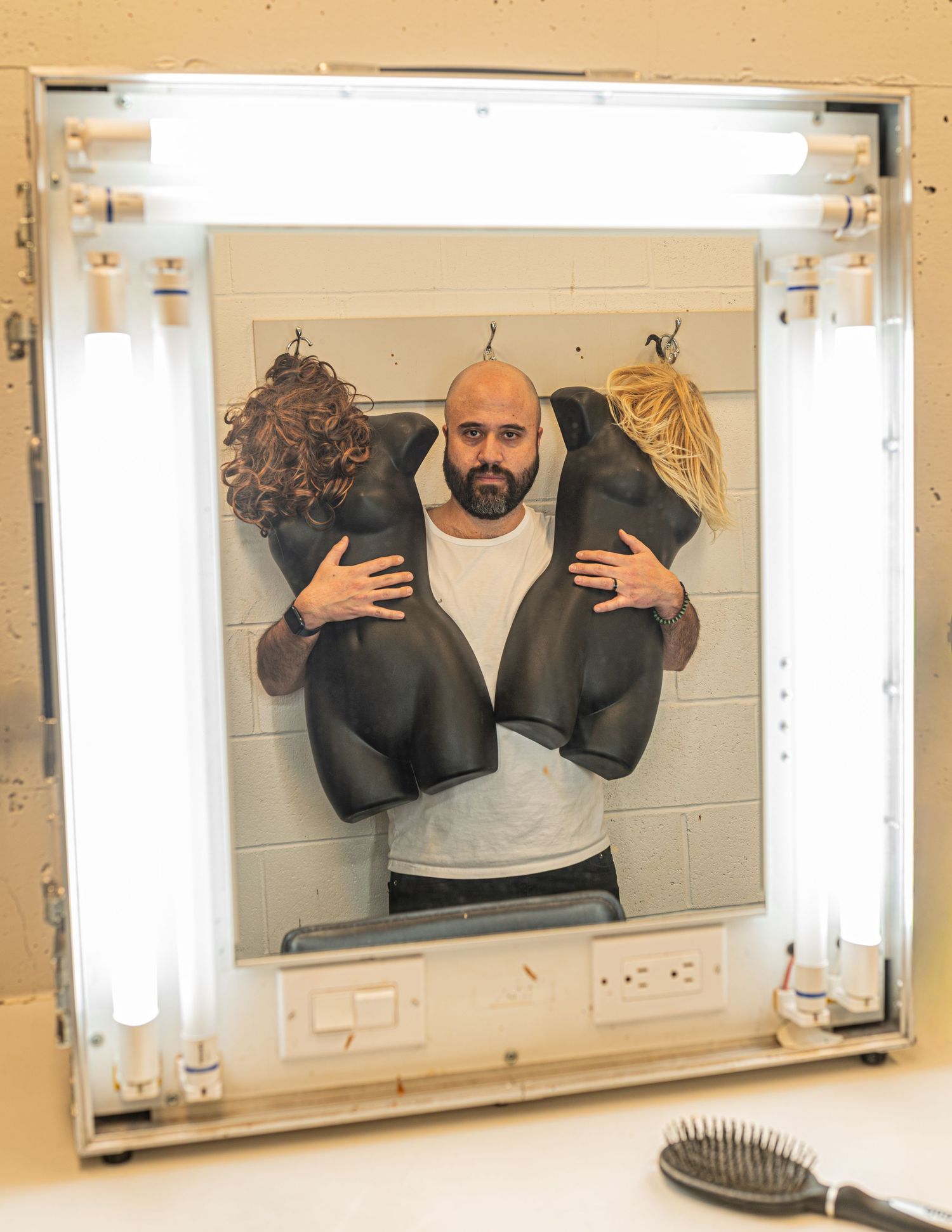 Mirror selfie sequence showing a person in a dark jacket and gray shirt in a bathroom setting.