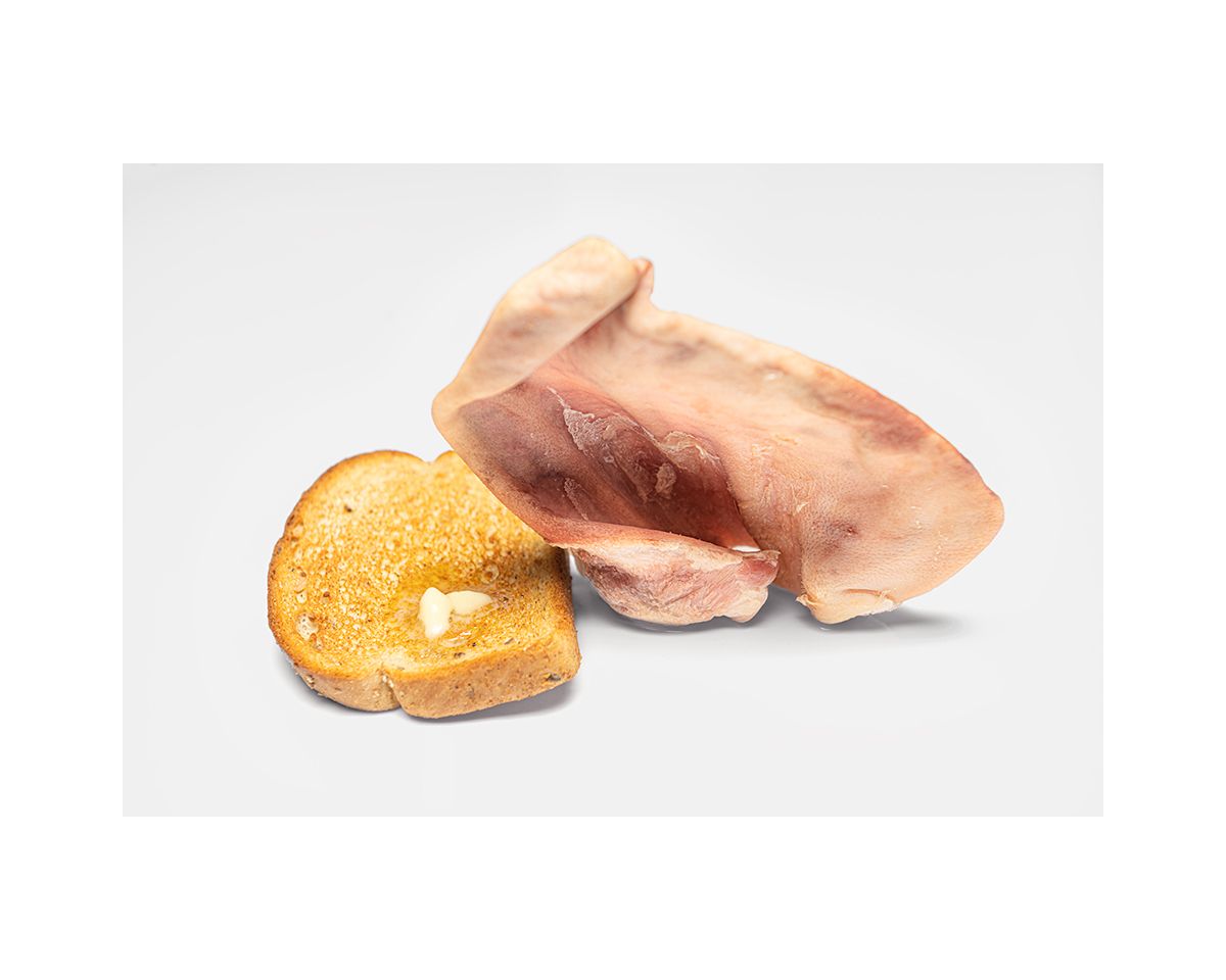 Raw ham slice and golden mushroom on white background, fresh deli meat and fungi food photography.
