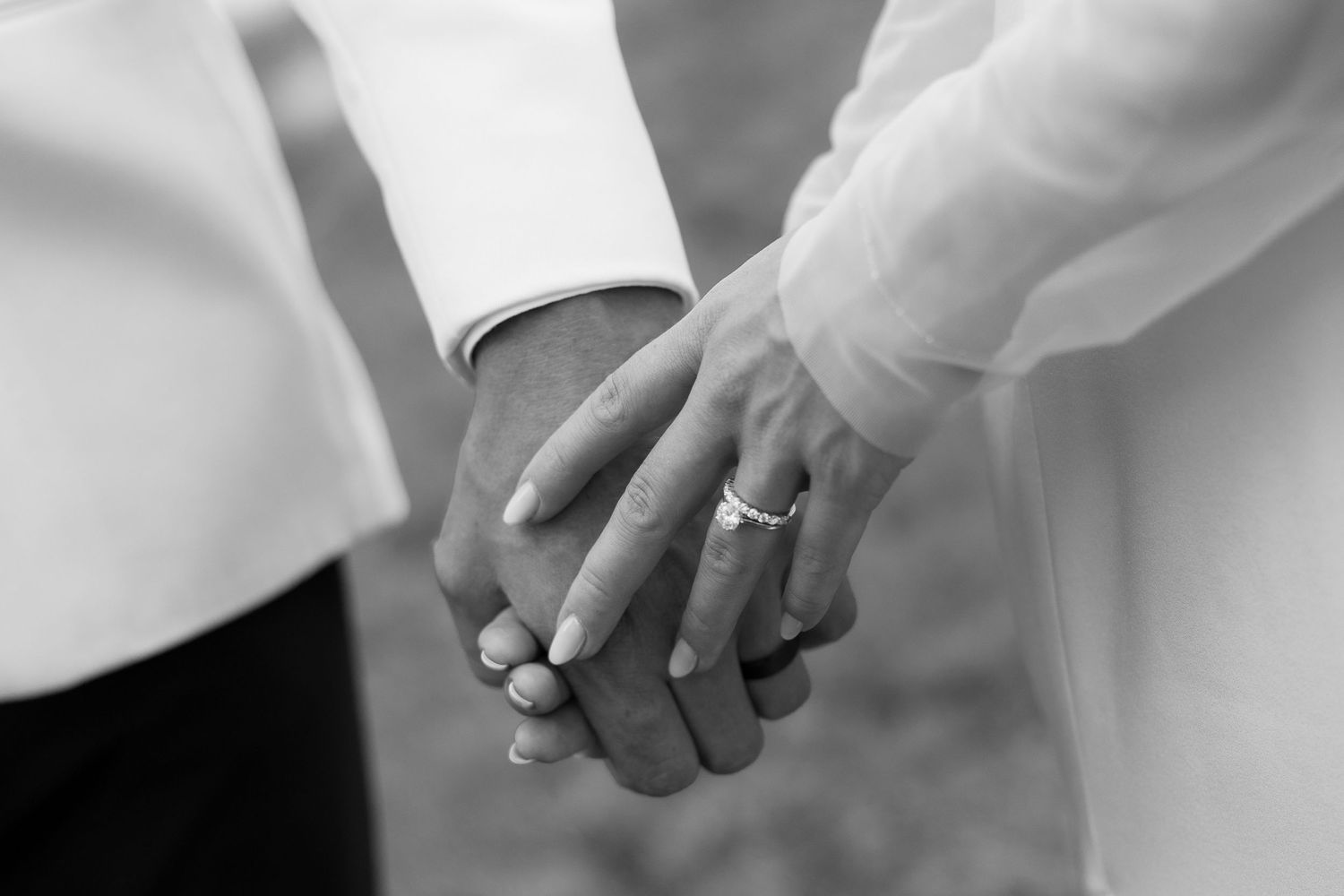 Close-up detail shots of wedding rings and hands.