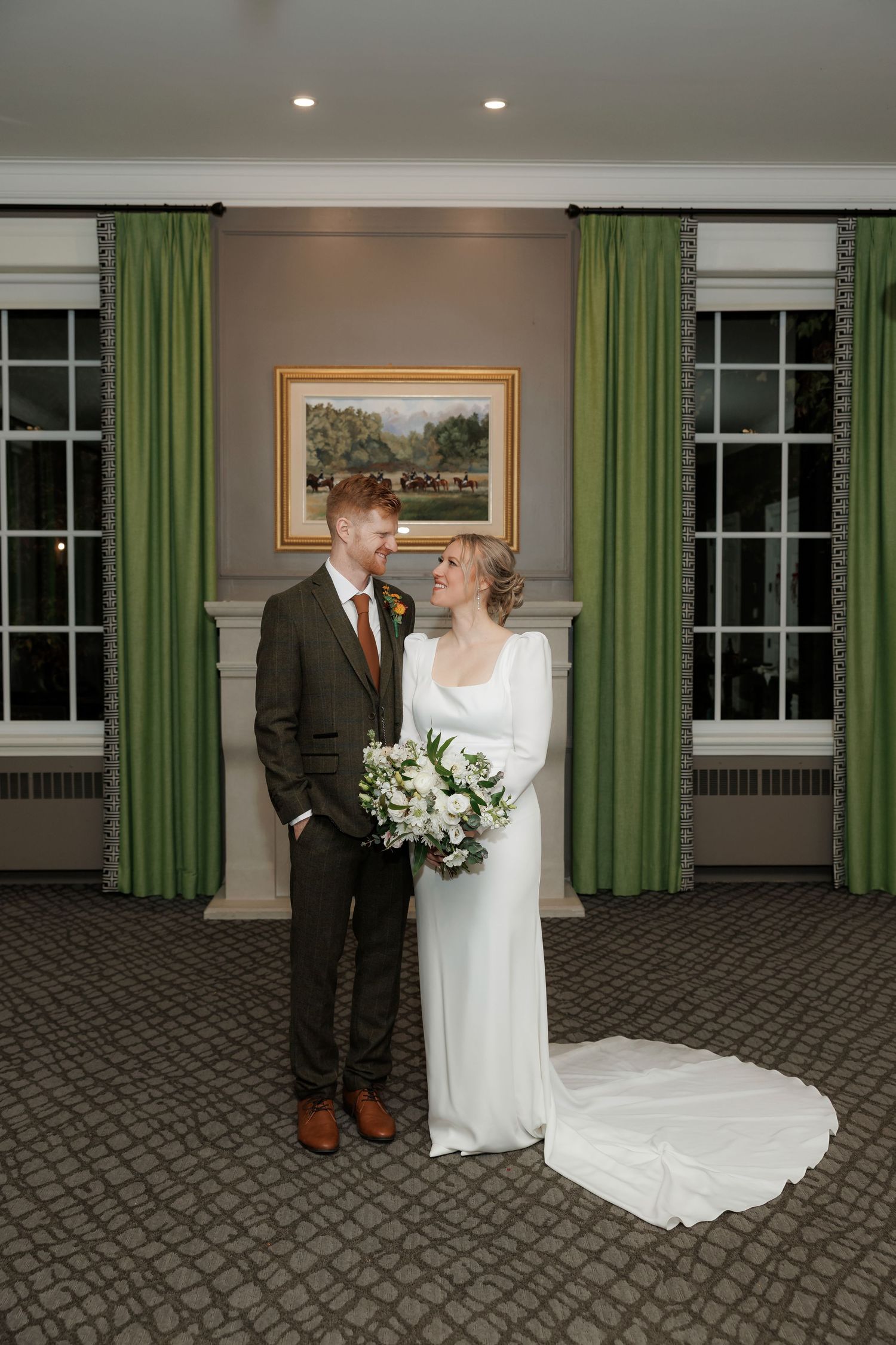 A series of wedding photos showing a couple in formal attire posing in an elegant room with green curtains and carpeted floor.