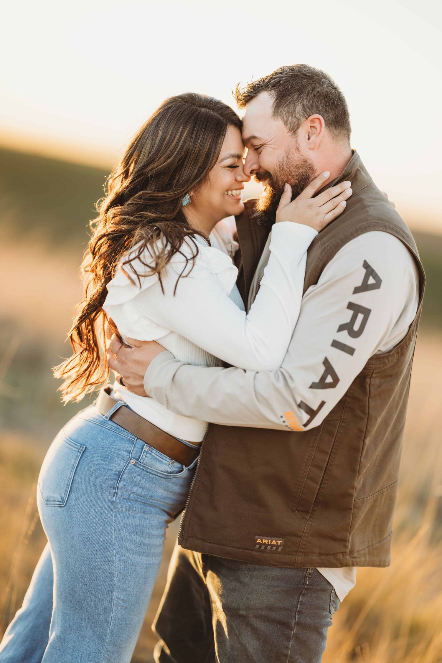 A woman holding her husband's face and embracing him.