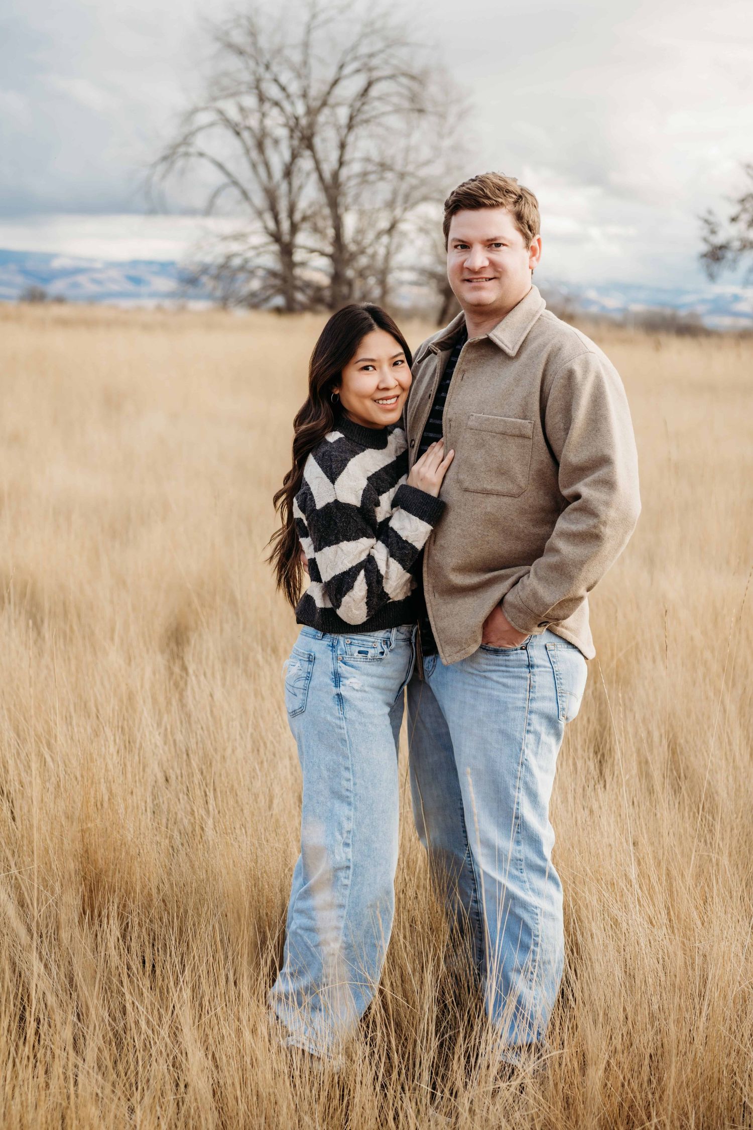 A portrait of a couple dressed in neutral tones in Walla Walla.