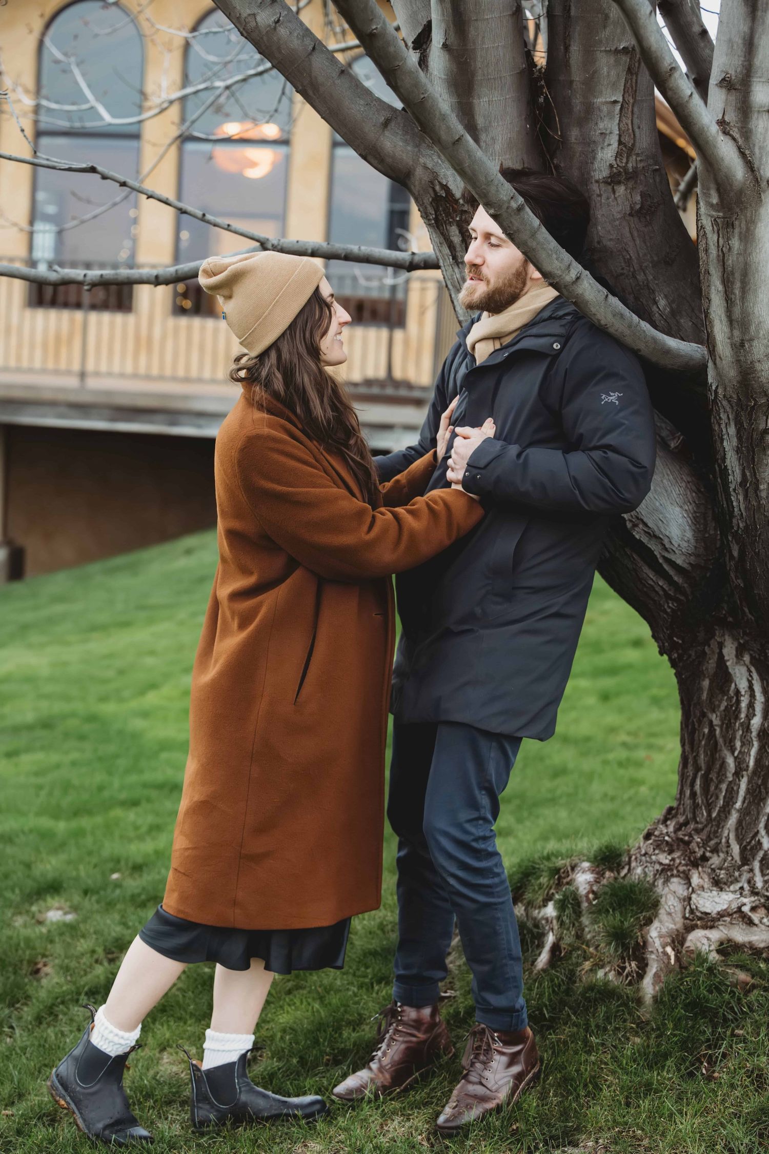 A couple sharing a moment together underneath a tree on a cool winter day in Walla Walla.