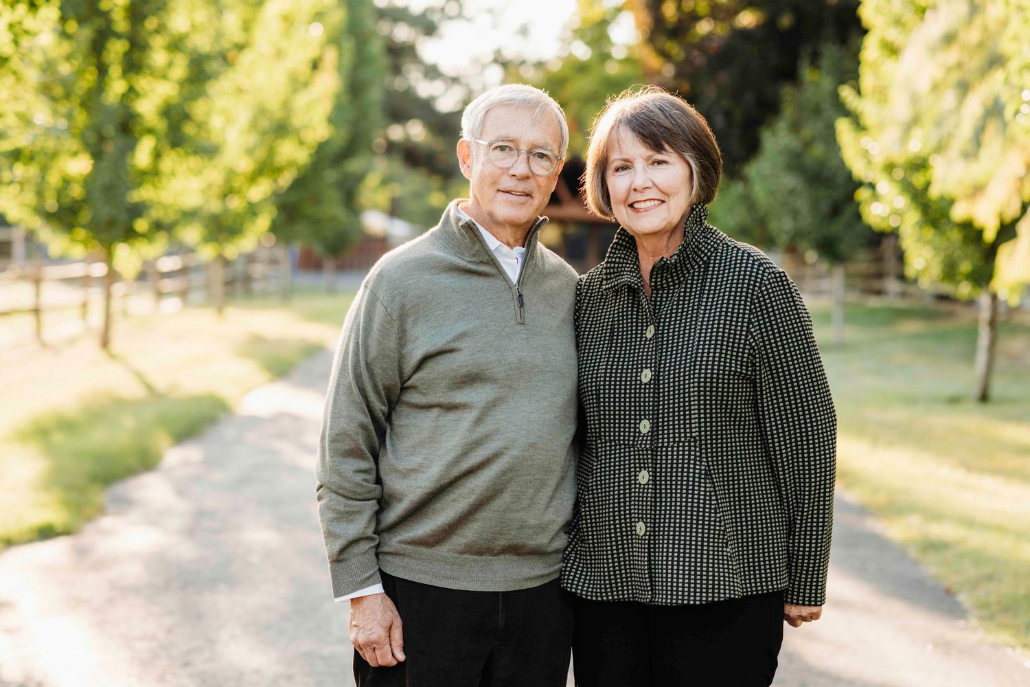 Older couple smiling together during an outdoor couples portrait session in Walla Walla.