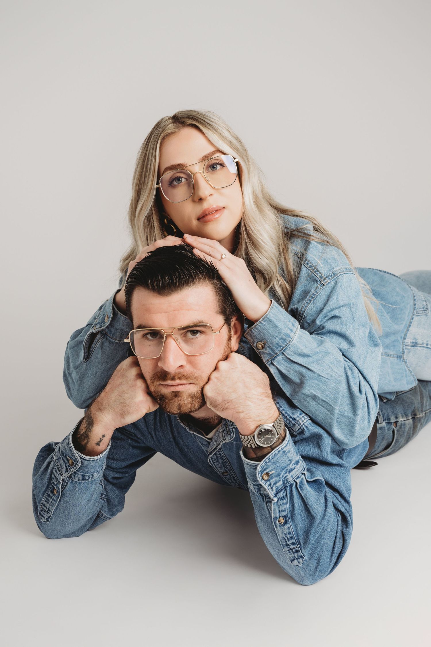 Intimate studio couples portrait of a couple lying together in a Walla Walla photography studio