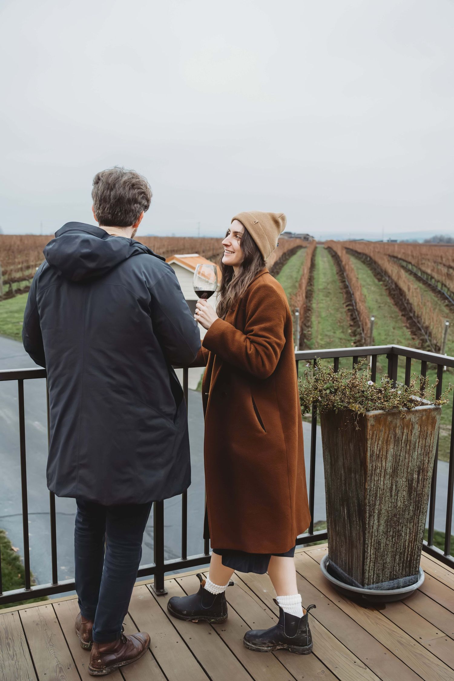 A couple on the balcony at Pepperbridge Winery.