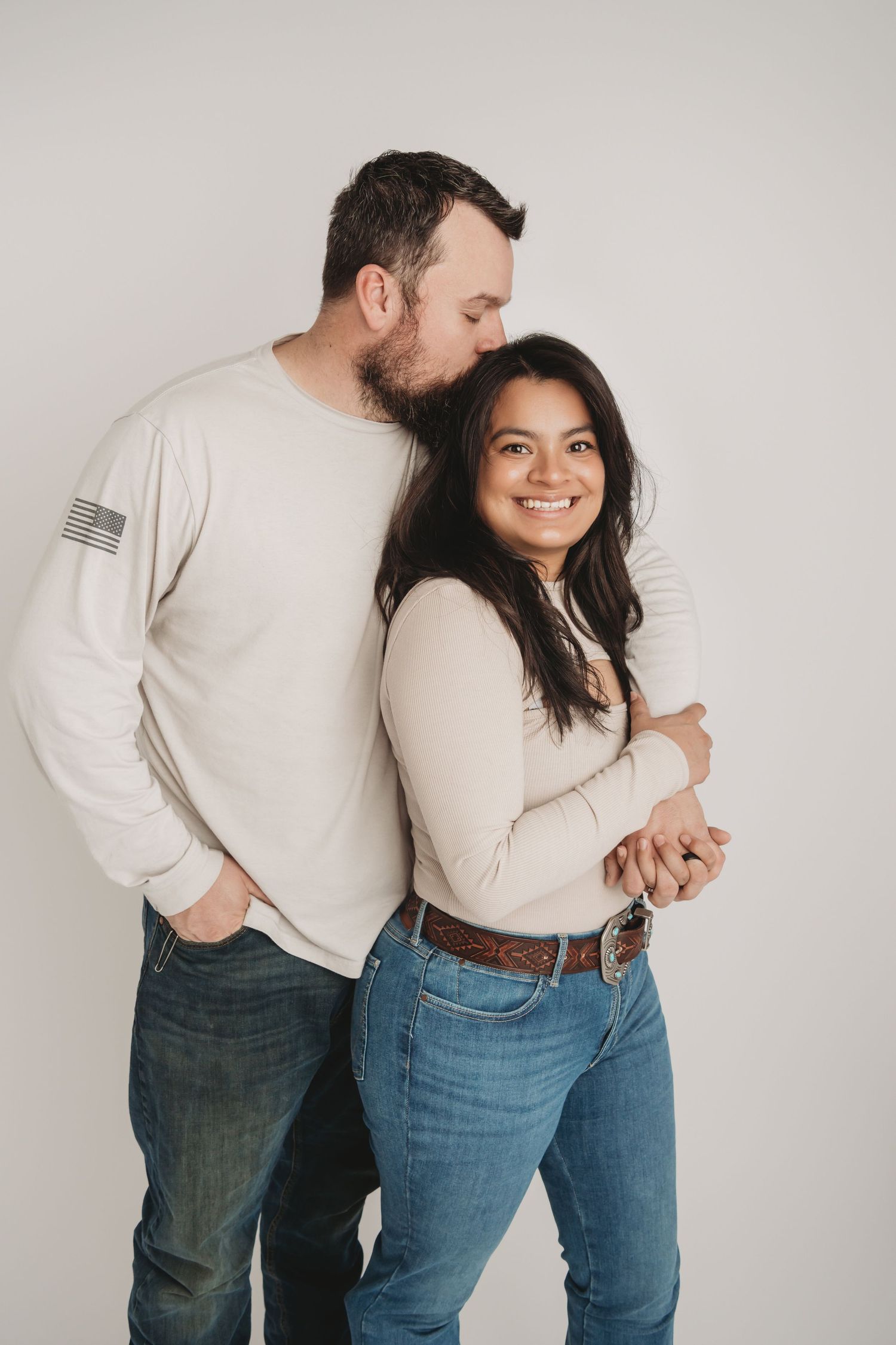 Studio portrait of a couple sharing a quiet, affectionate moment during a Walla Walla couples session