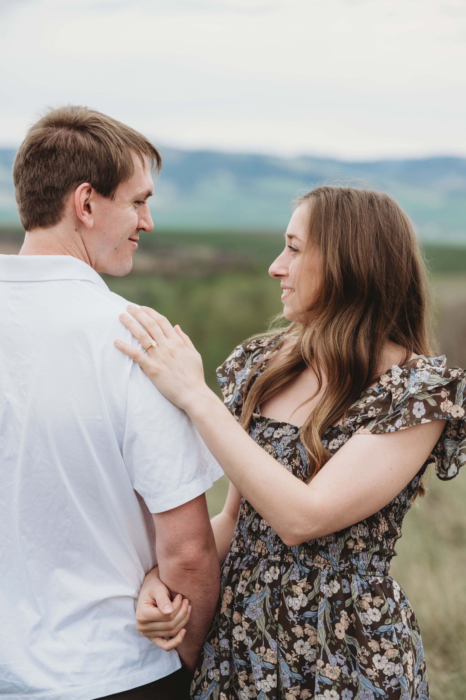A couple looking at each other just after getting engaged in Walla Walla.