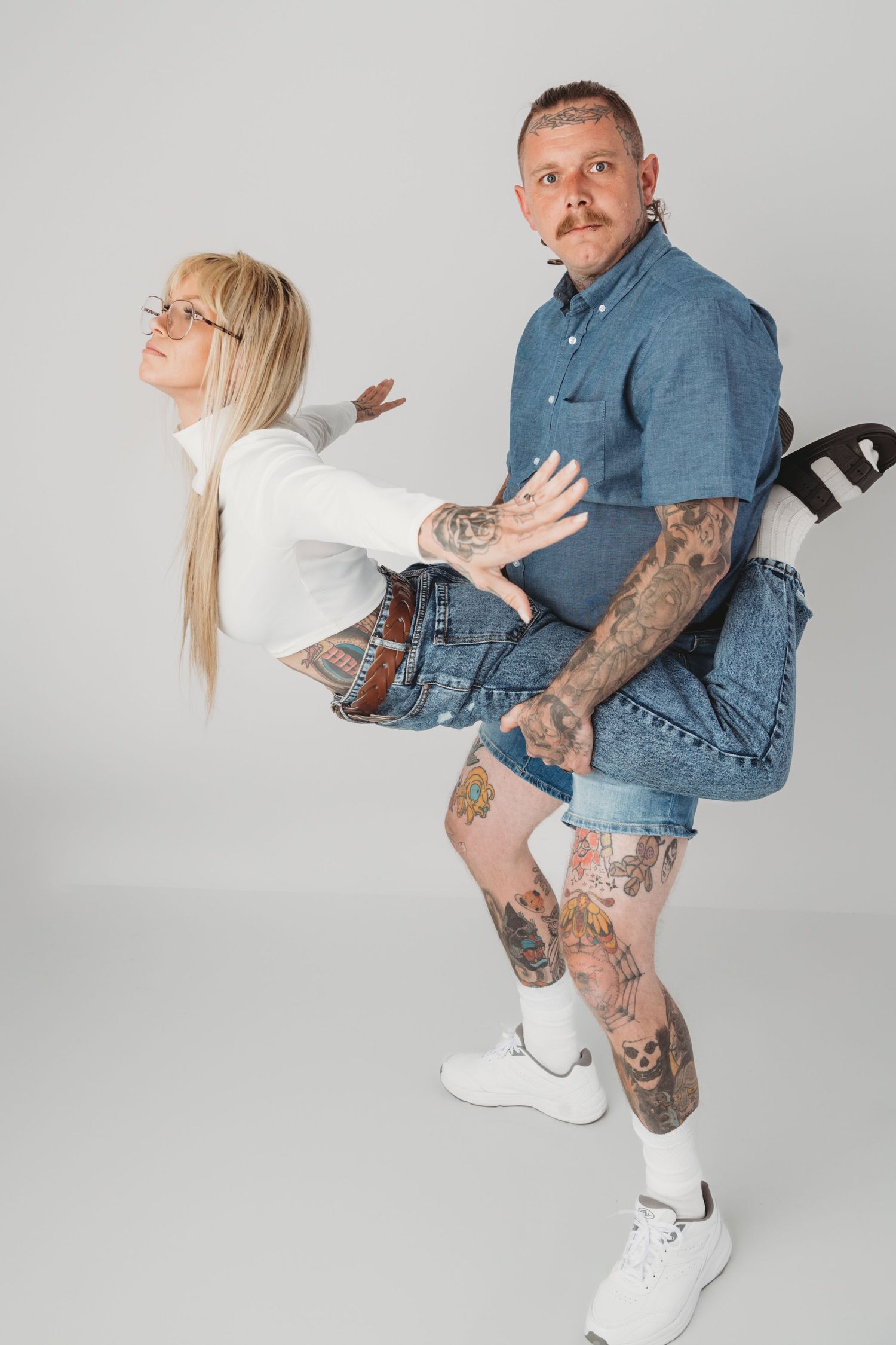 Fun and playful studio couples portrait photographed in a Walla Walla portrait studio