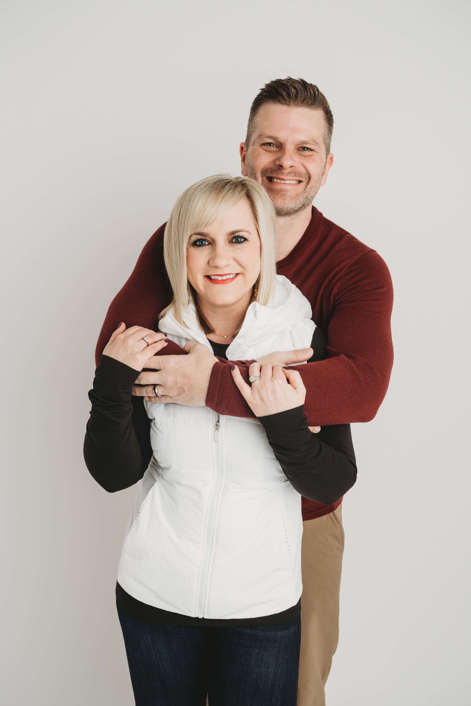 Romantic studio couples portrait of a couple embracing, photographed at a Walla Walla photography studio with soft, even lighting.