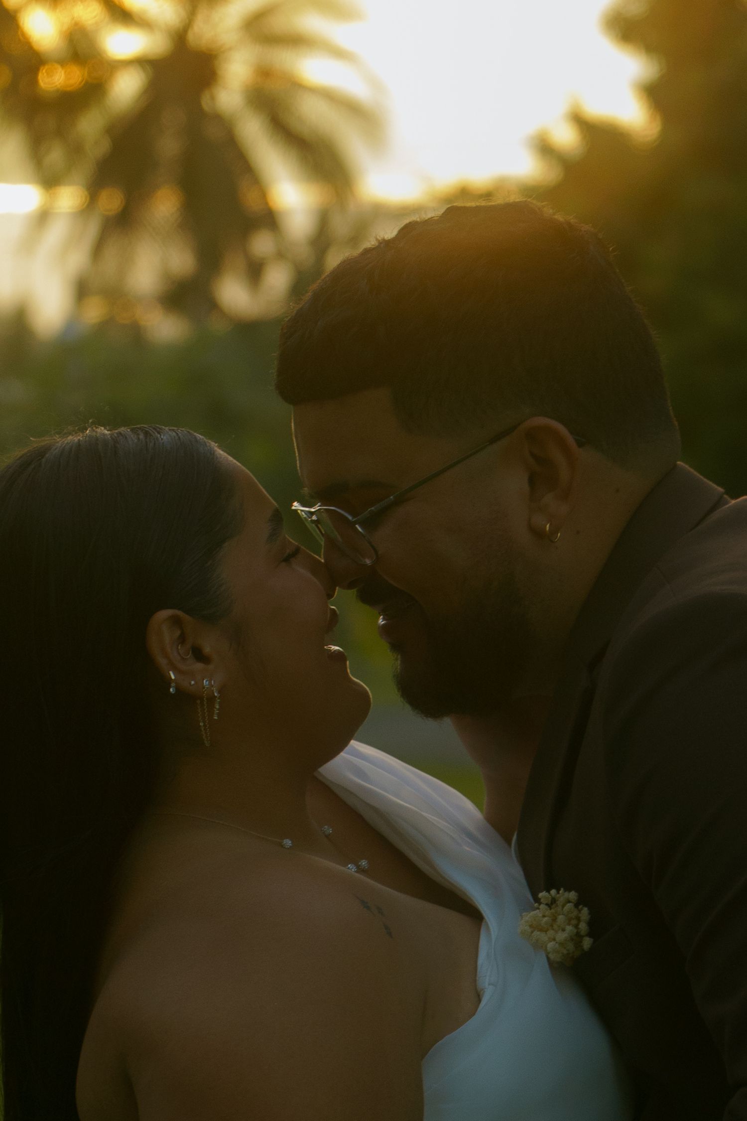 ethereal weddings couple photoshoot leaning for a kiss without strict posing for the camera.