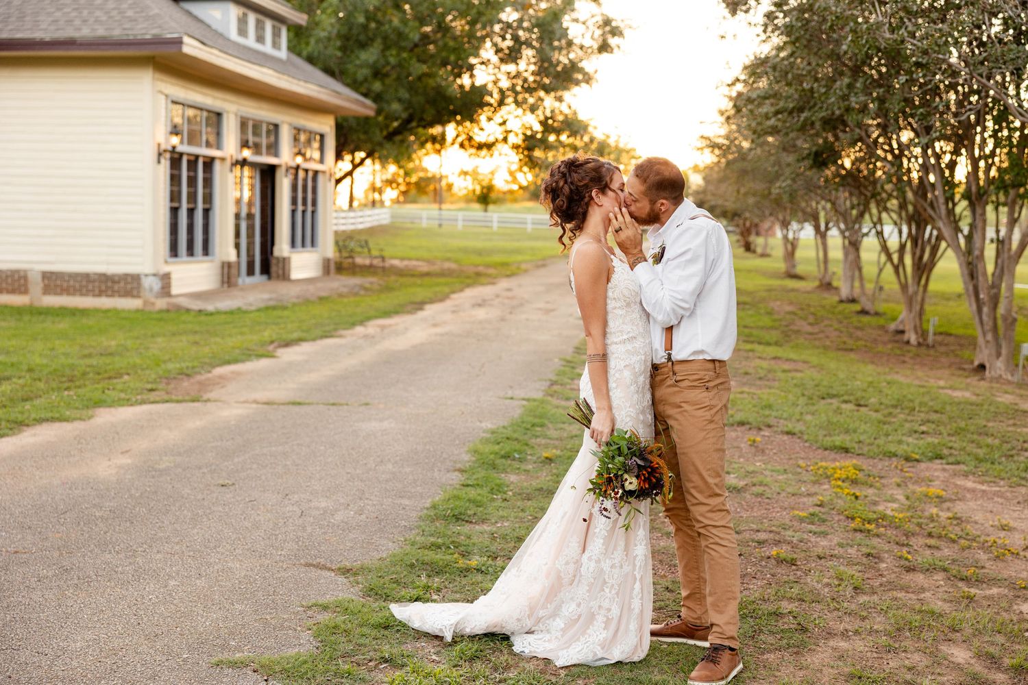 Bride and Groom kiss during sunset for a portrait by Nacogdoches photographer Emily Joy Photography