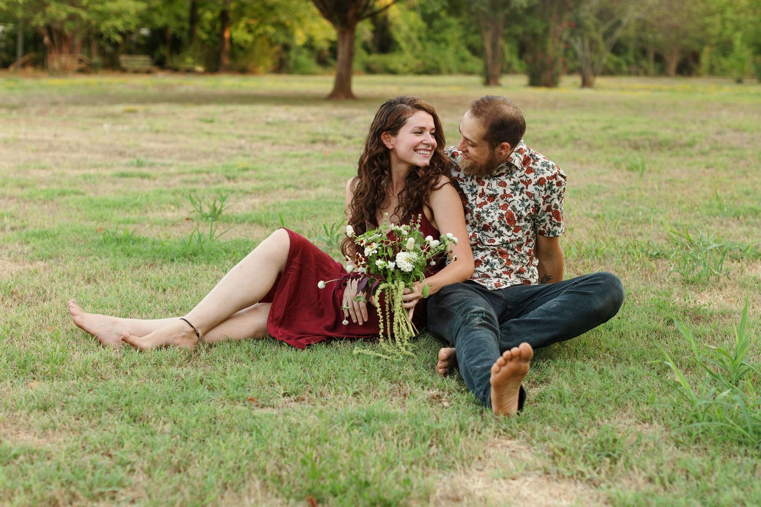 Engaged young lady smiles at the camera for a portrait by Nacogdoches photographer Emily Joy Photography