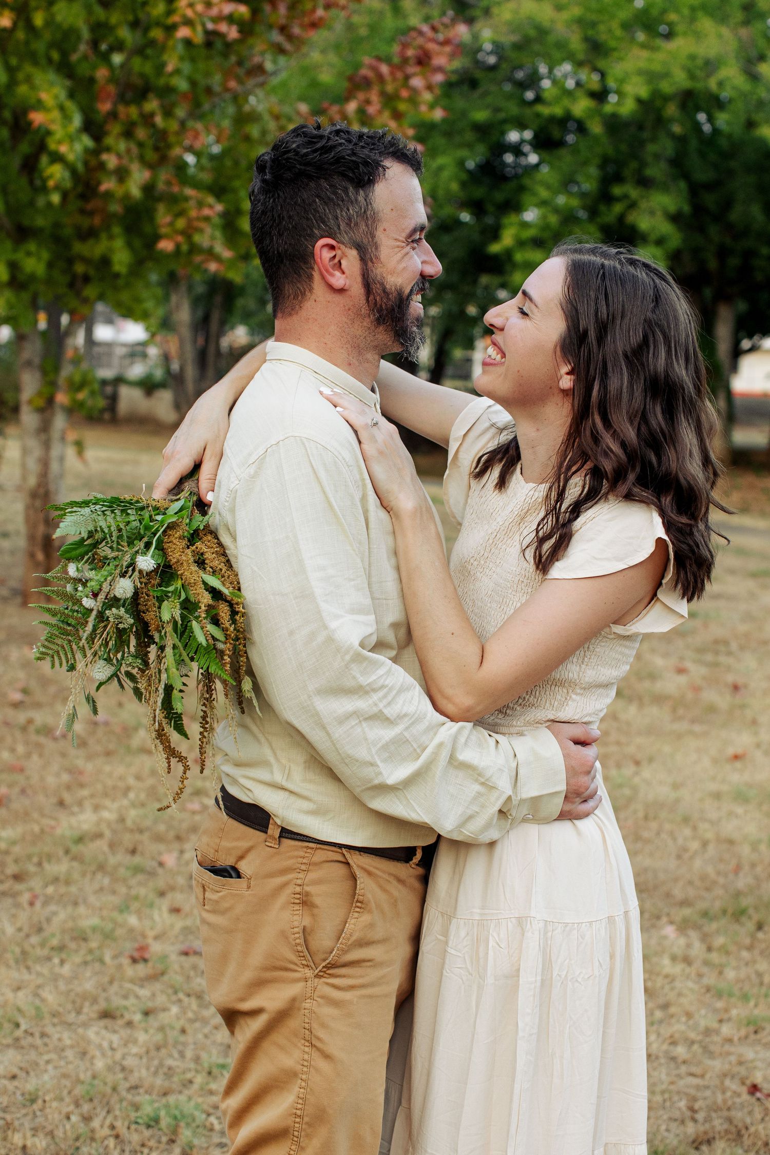 Candid, joyful portrait of a young couple by Emily Joy Photography, now a wedding photographer in Memphis, TN.