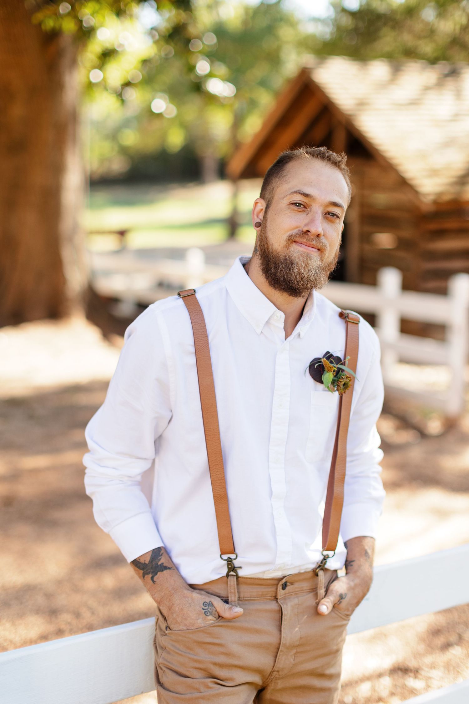 Groom smiles at the camera for a portrait photographed by Emily Joy Photography, now a wedding photographer in Memphis, TN.