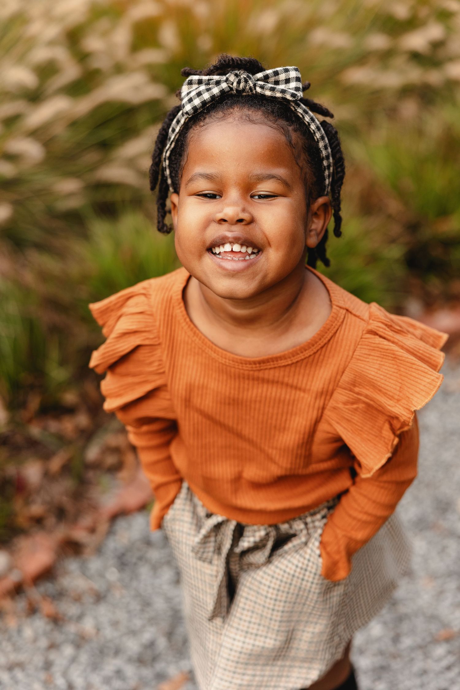 Portrait of a cheerful little girl by Memphis Family Photographer Emily Joy Photography