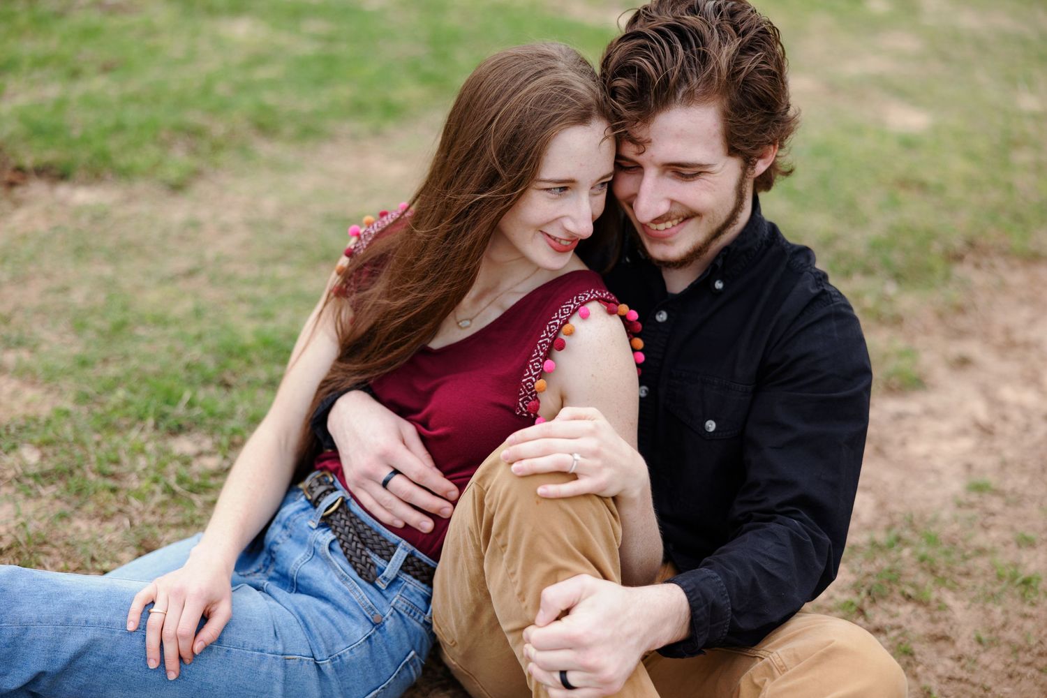 Portrait of a young couple sitting and snuggling, by Nacogdoches Memphis photographer Emily Joy Photography