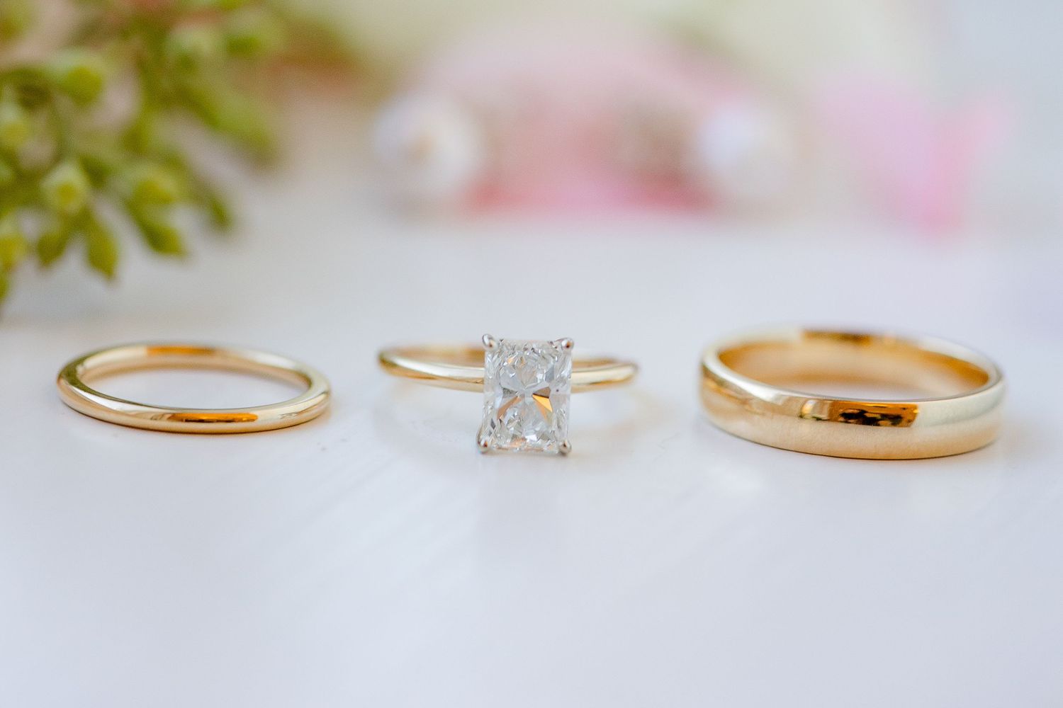 A portrait of three golden rings by Memphis wedding photographer, Emily Joy Photography