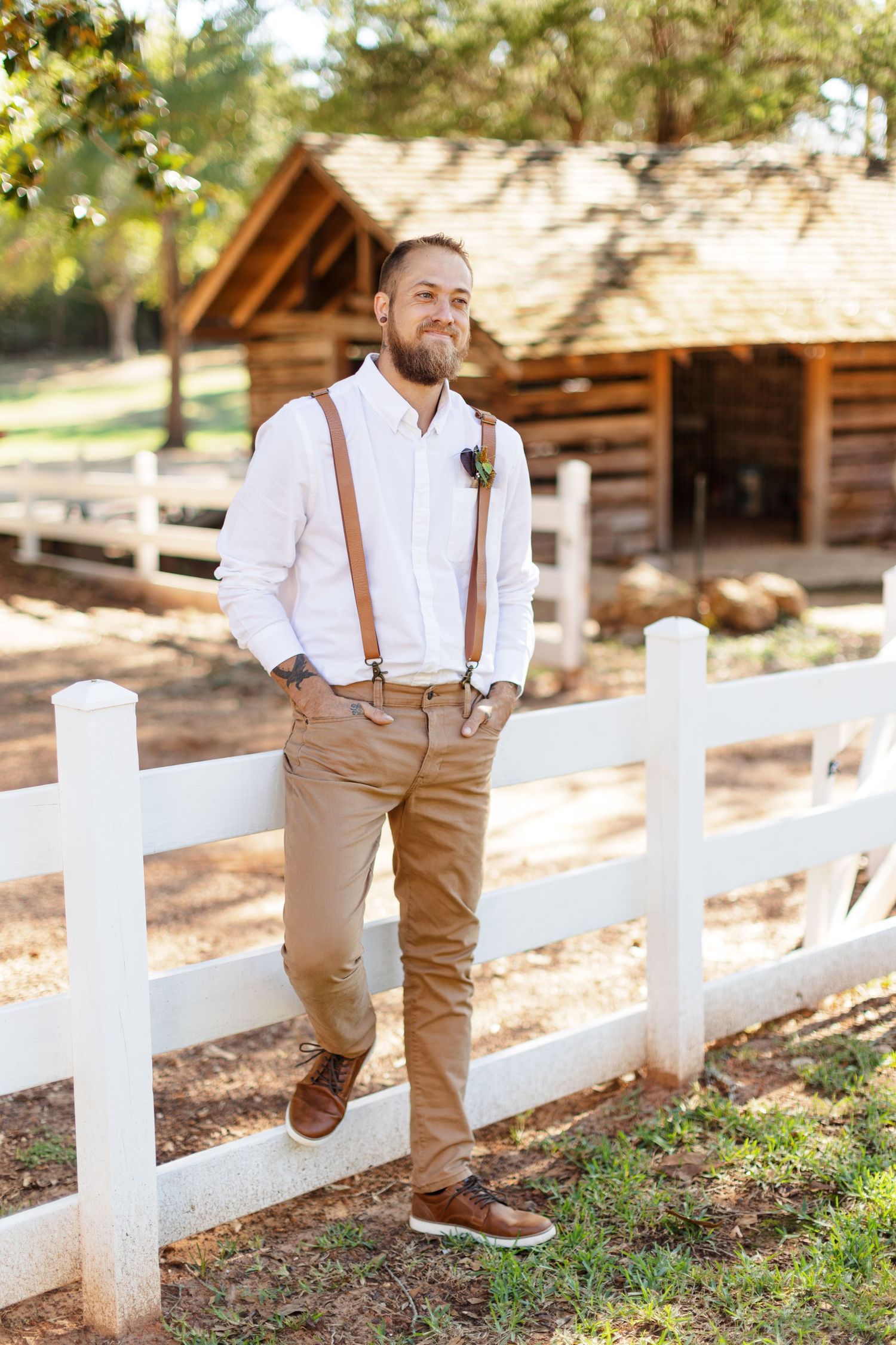 Groom smiles off-camera for a portrait photographed by Emily Joy Photography, now a wedding photographer in Memphis, TN.