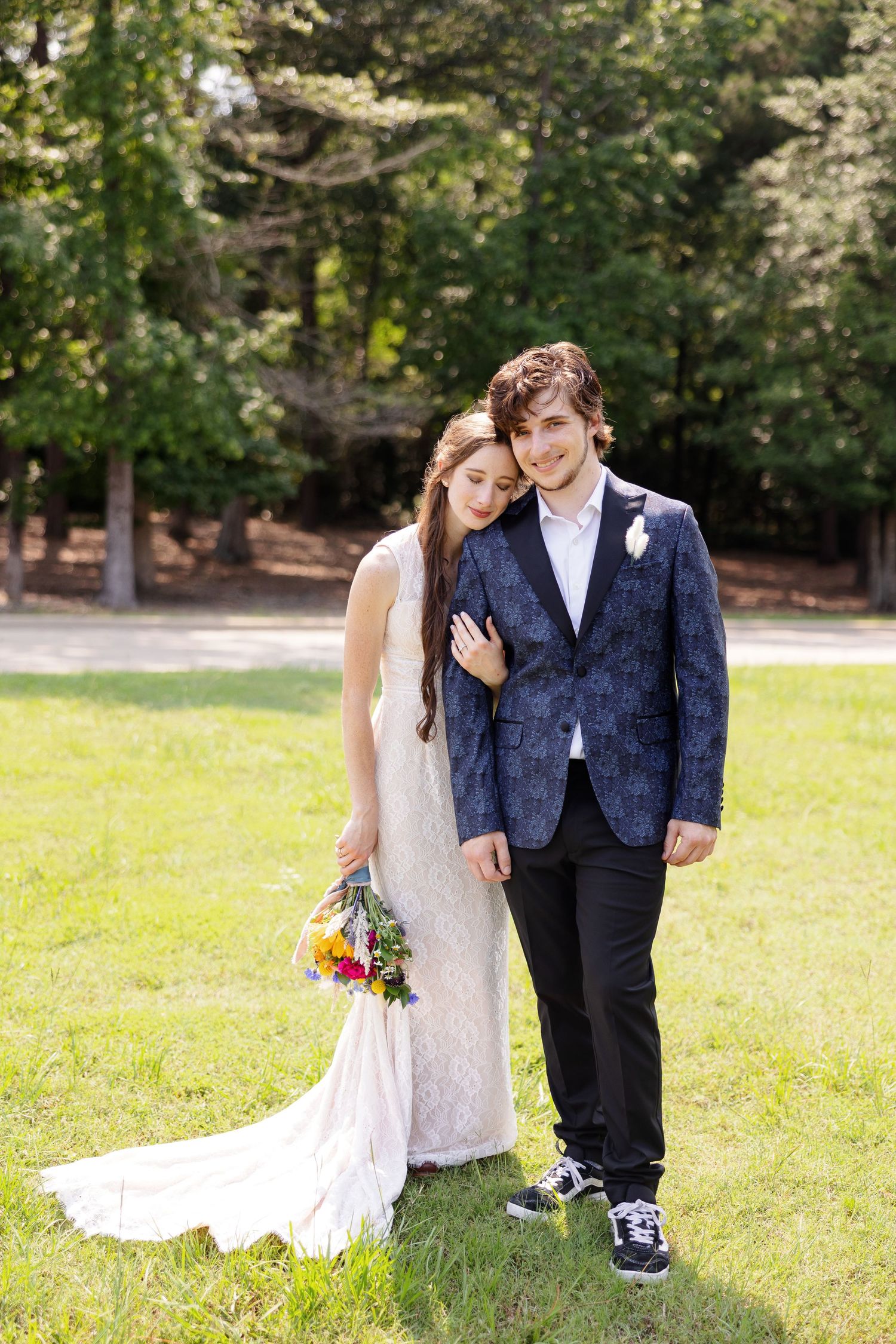 Portrait of bride and groom in the sun by Memphis wedding photographer Emily Joy Photography