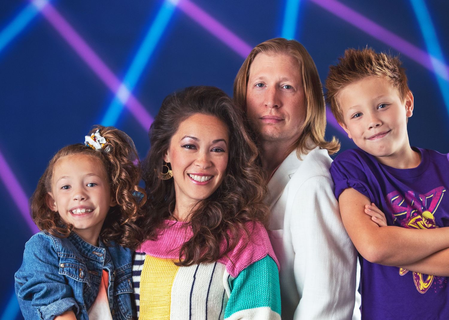 Studio portraits featuring blue and pink neon lighting effects.