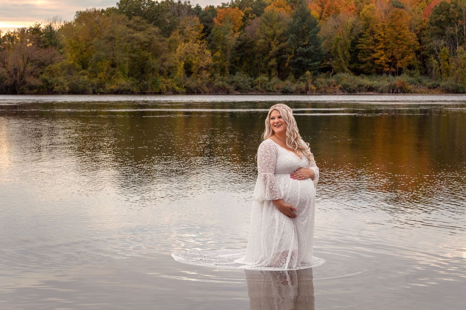 Lakeside photo session with dramatic sunset and autumn colors.
