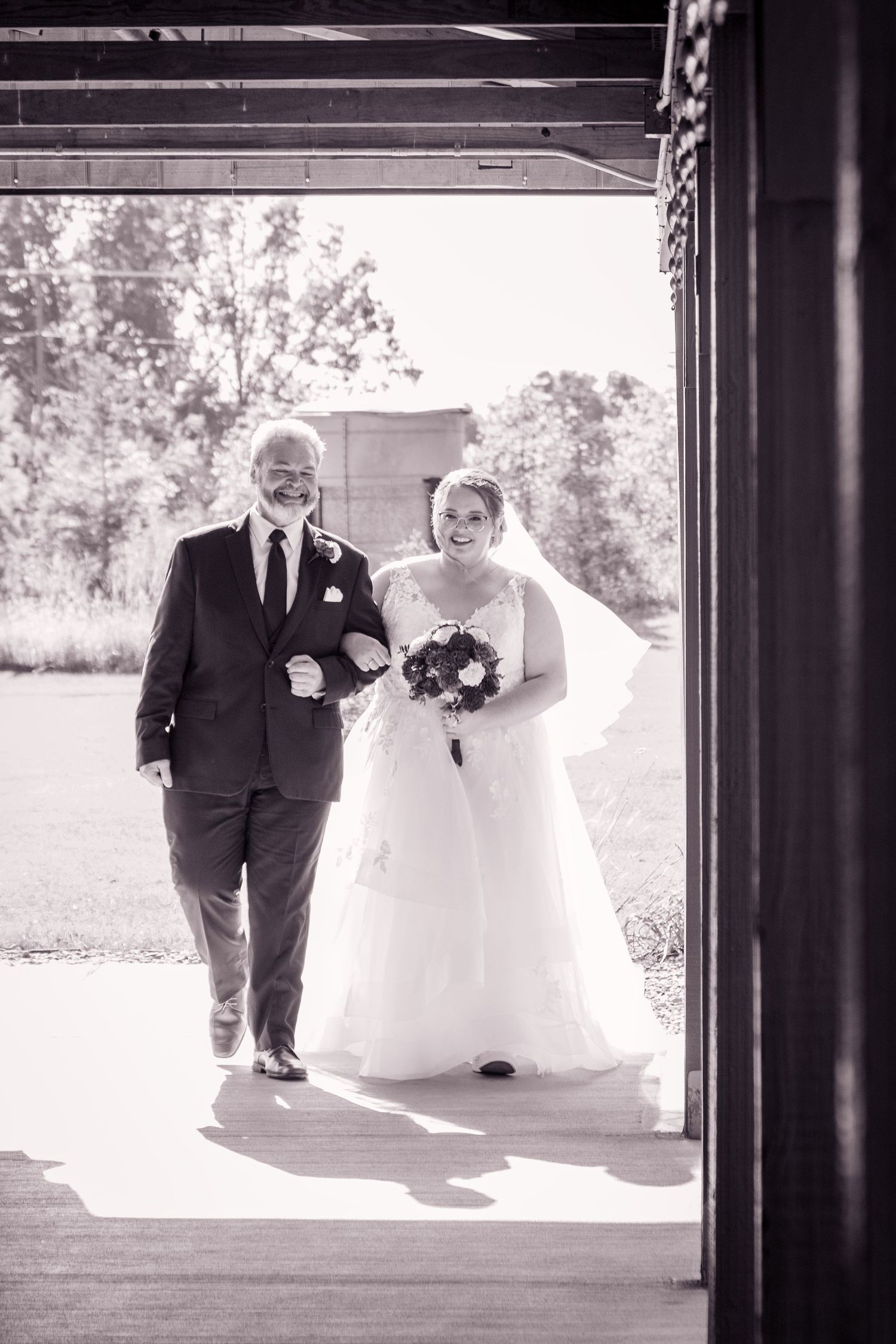 Black and white wedding portrait sequence showing a father/daughter walking through a doorway.