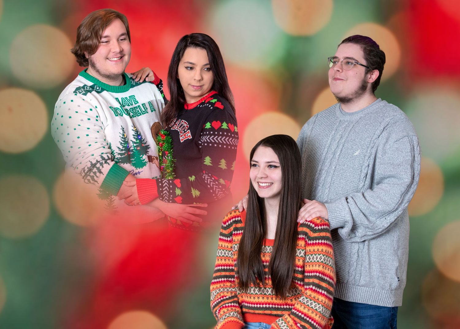 Holiday portraits with festive bokeh lights and cozy winter sweaters.