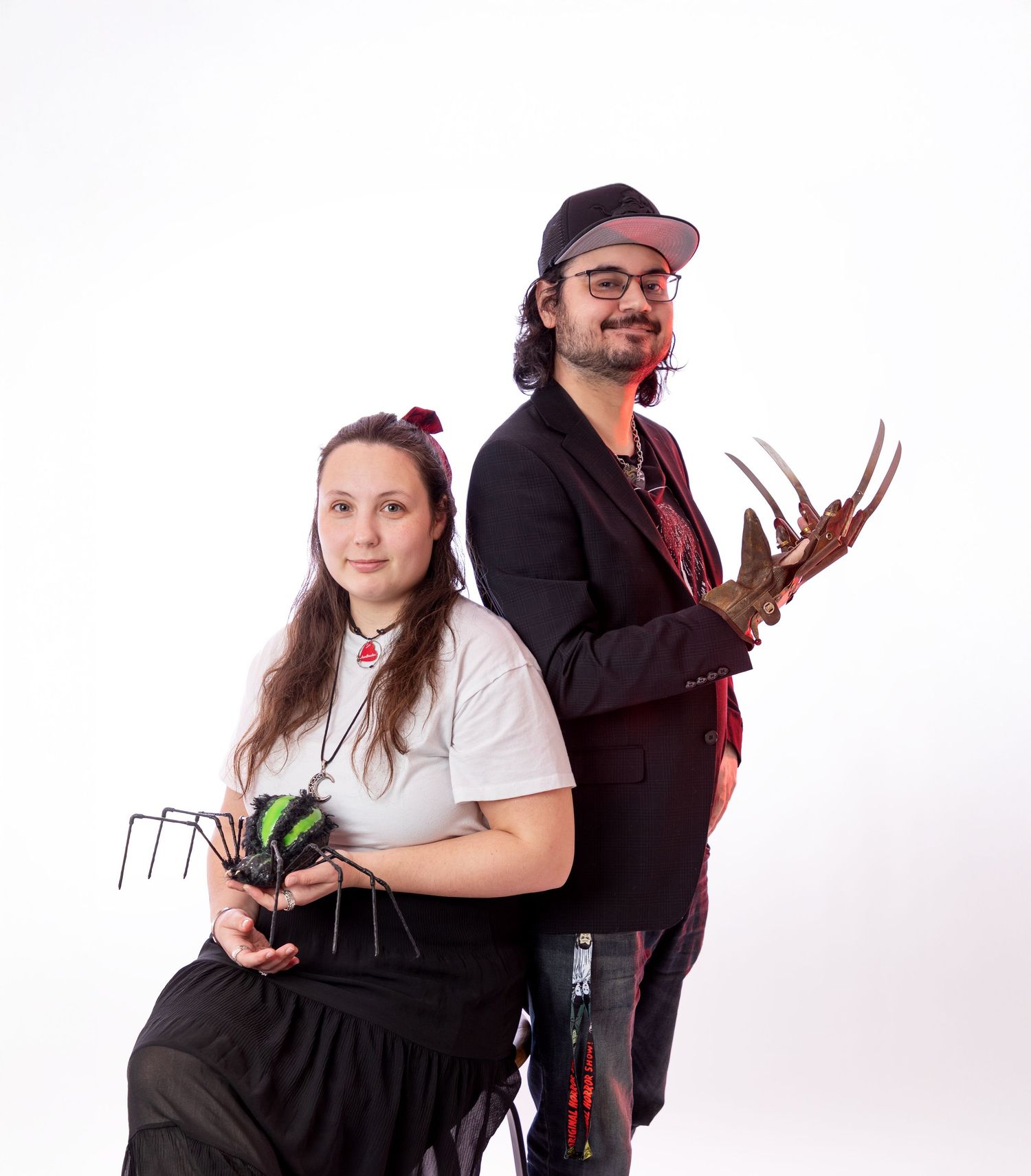 Casual studio portraits with fun interactions against white backdrop.