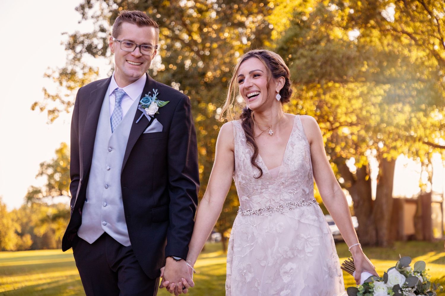 Newlyweds sharing romantic moments during golden hour photography session.