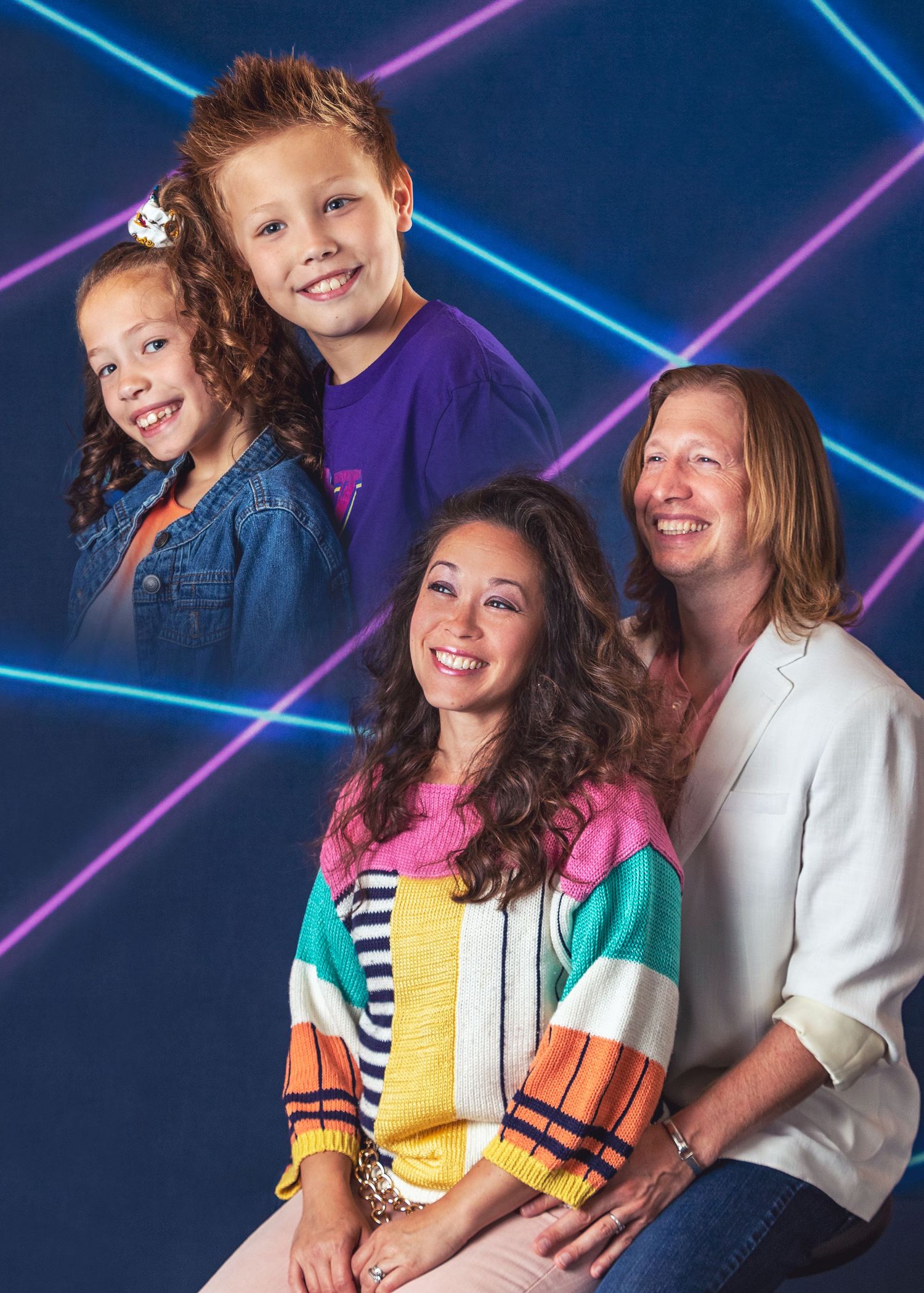 Studio portraits with colorful neon lights and geometric patterns in the background.