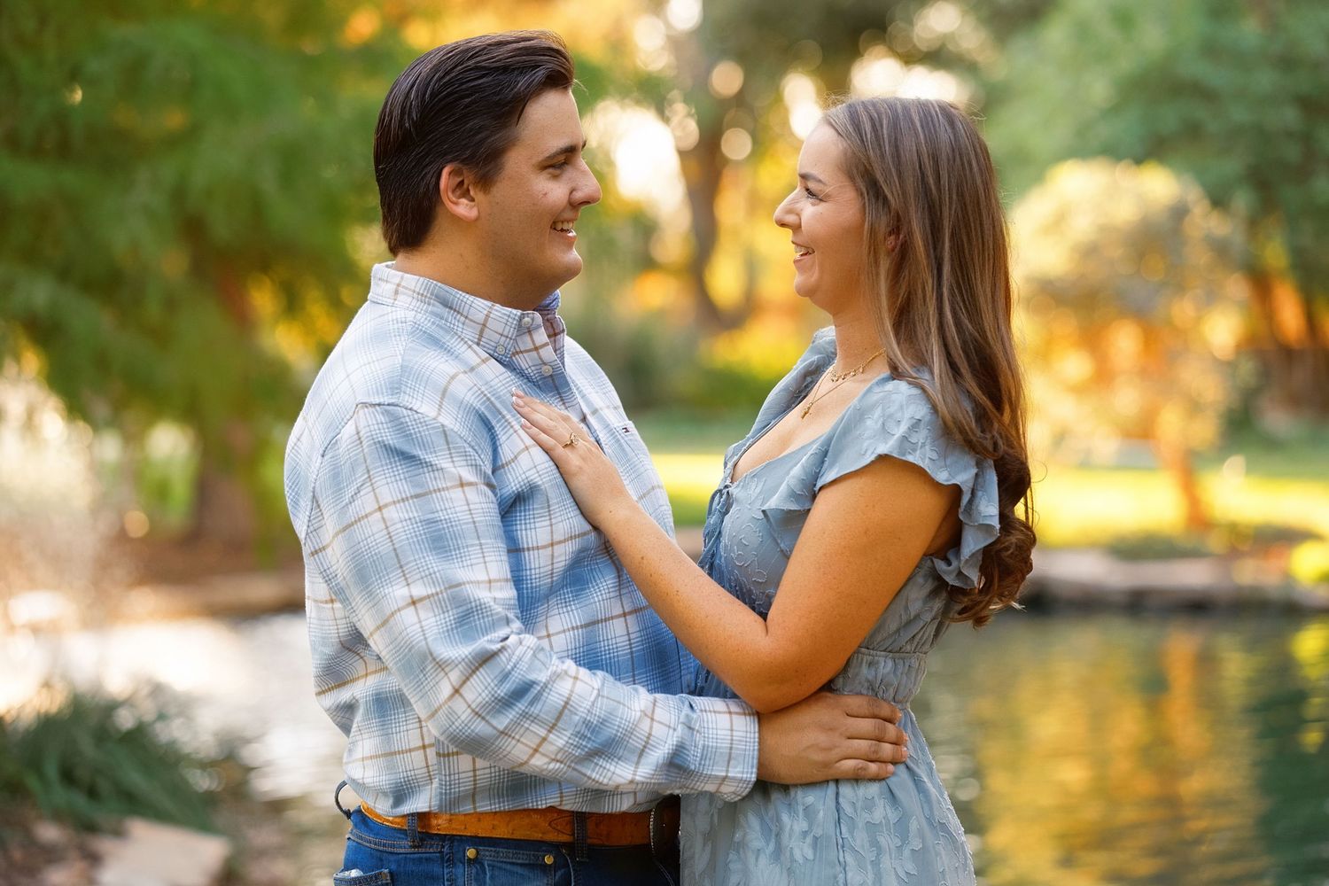 newly engaged couple at sunset just after his proposal in the garden of The Gage Hotel in Marathon, Texas. Destination engagement session.