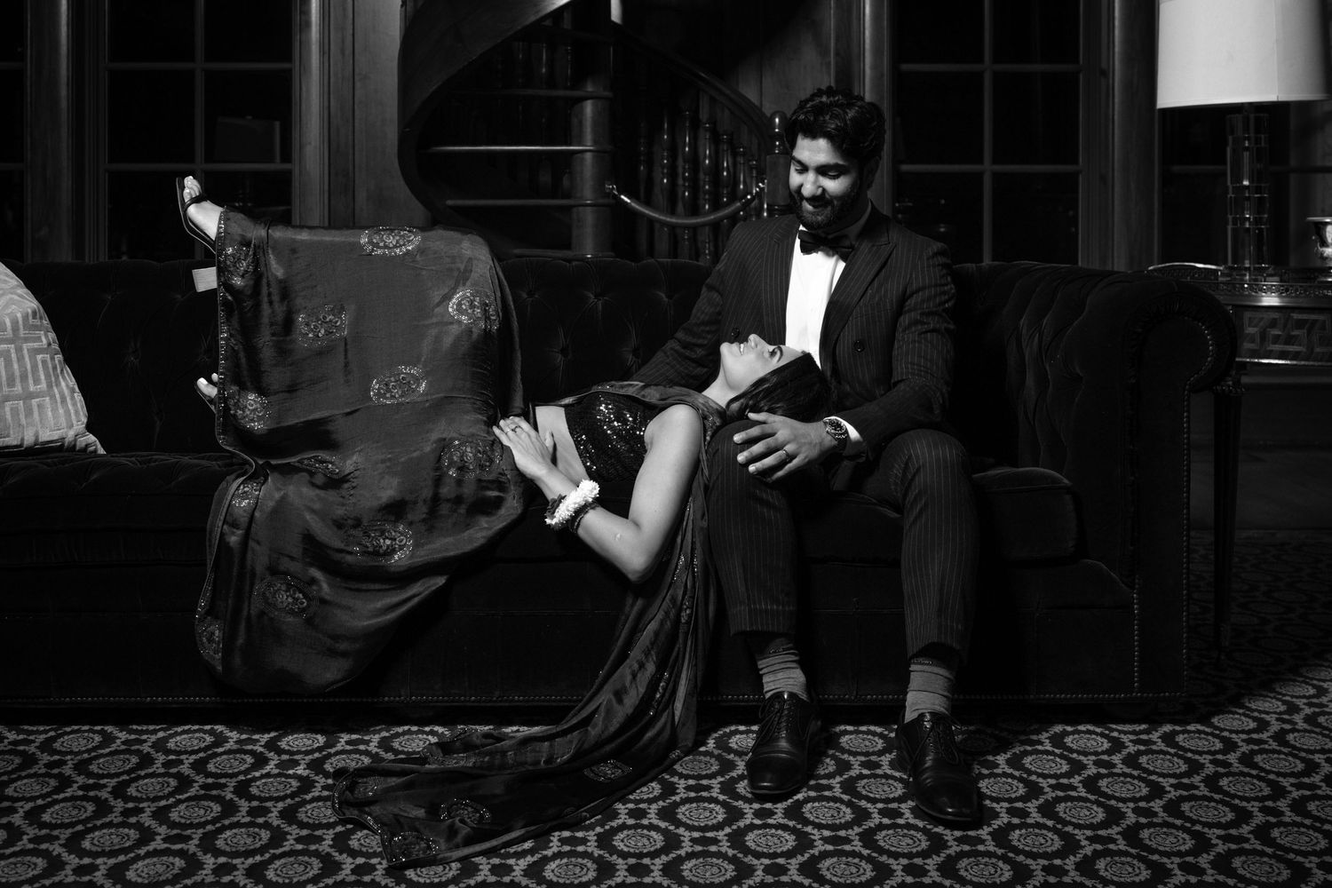 black and white photo of bride and groom intimate quiet moment in the library of the Olana Walters Wedding Venue